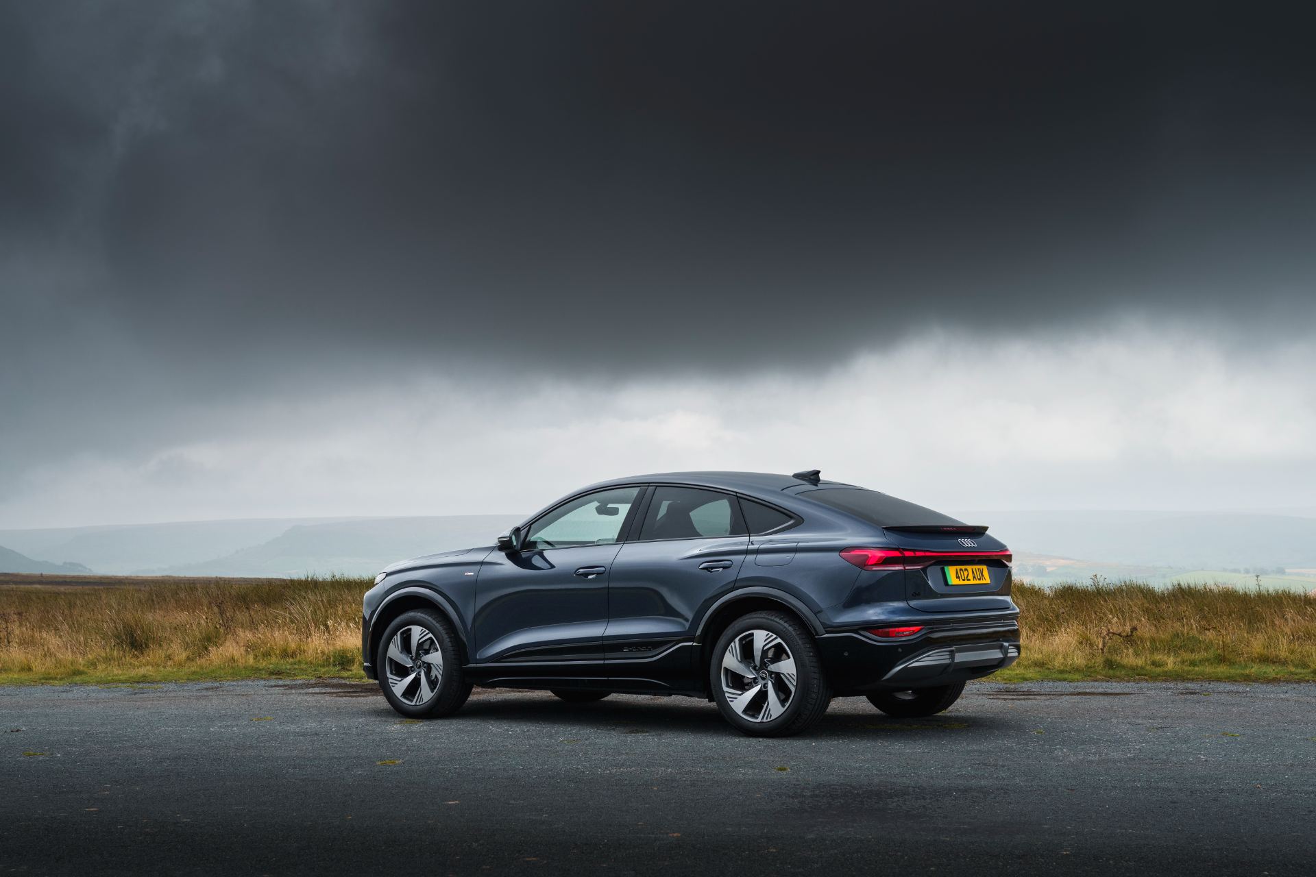 2026 audi q6 sportback e tron rear three quarter grey