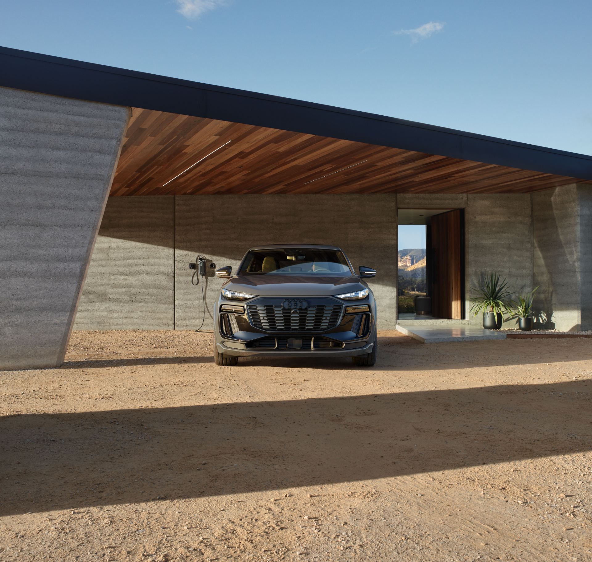 2027 audi q6 sportback e tron front charging carport grey