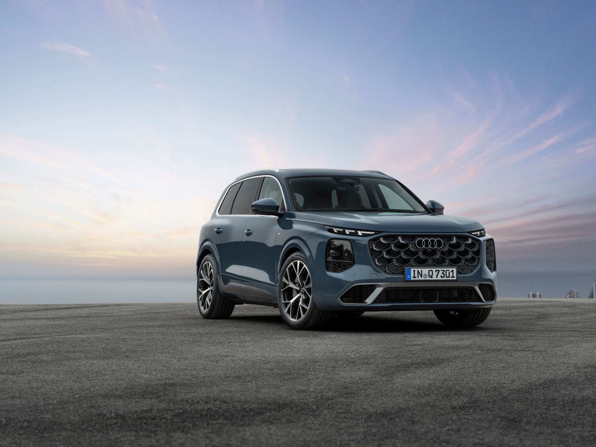 2027 audi q7 front three quarter coast blue