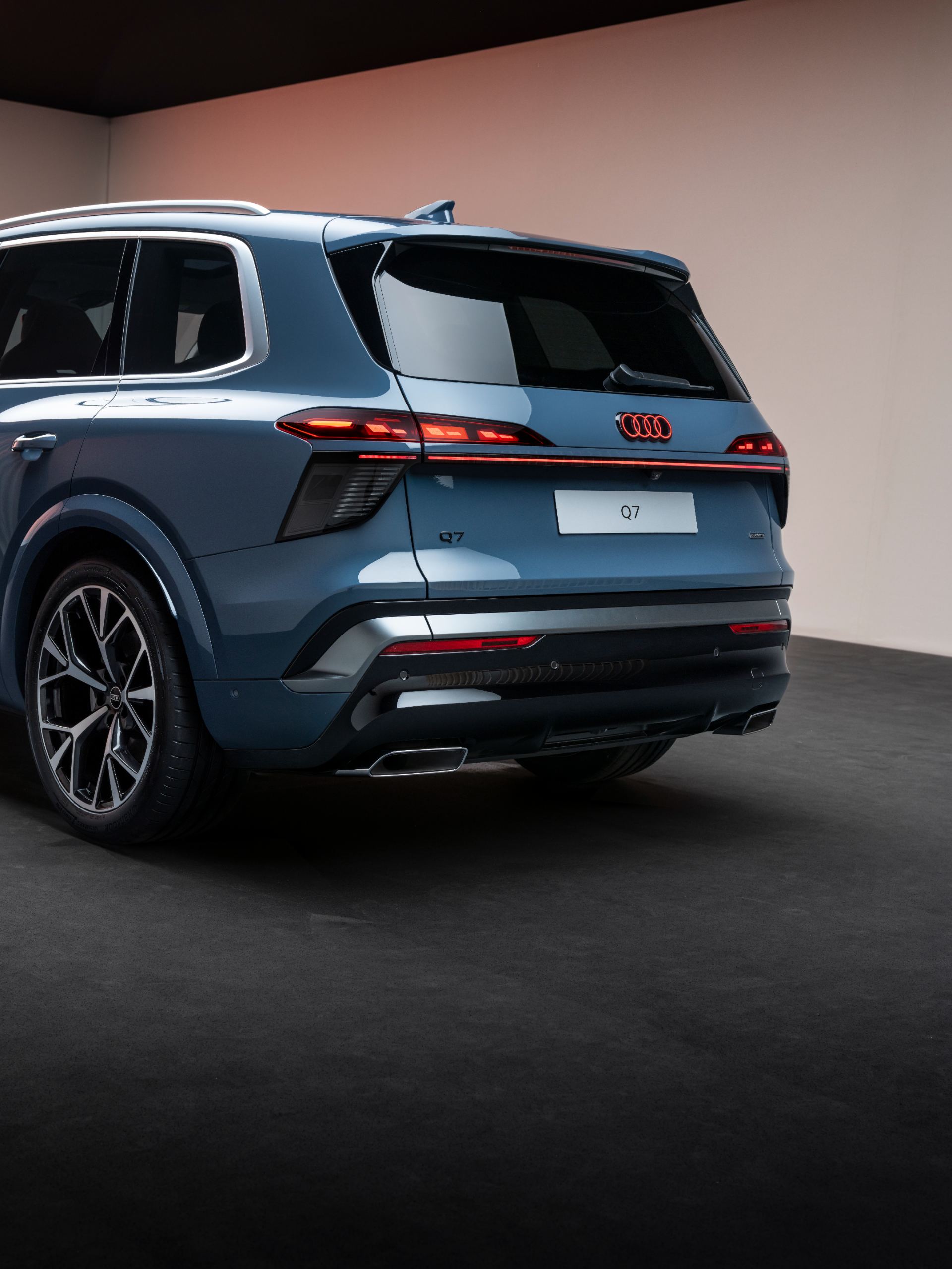 2027 audi q7 rear three quarter studio portrait blue
