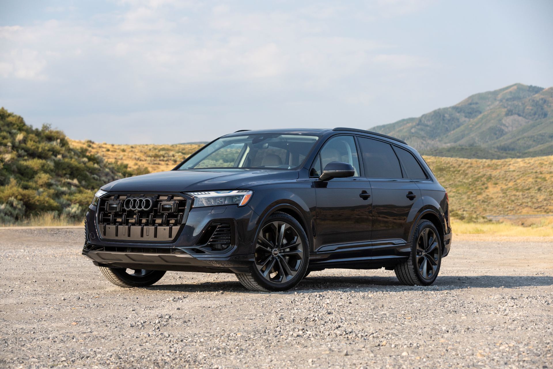 2026 audi q7 front three quarter mountains waitomo blue