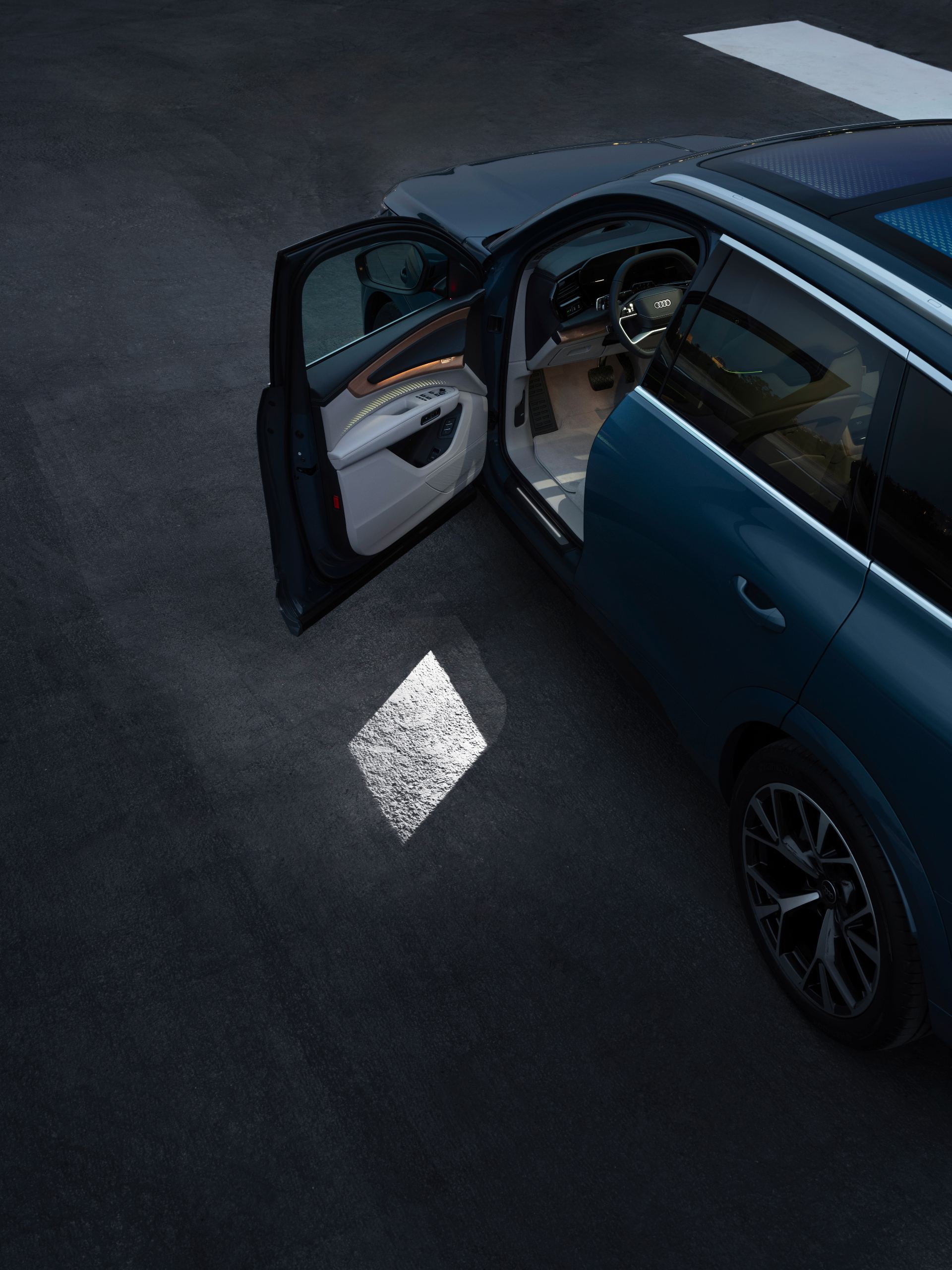 2026 audi q7 suv door open puddle light