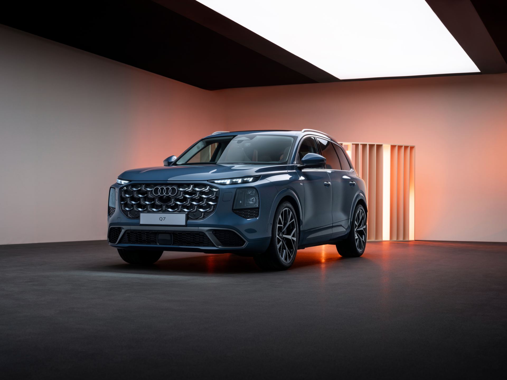 2026 audi q7 suv front three quarter low angle studio blue