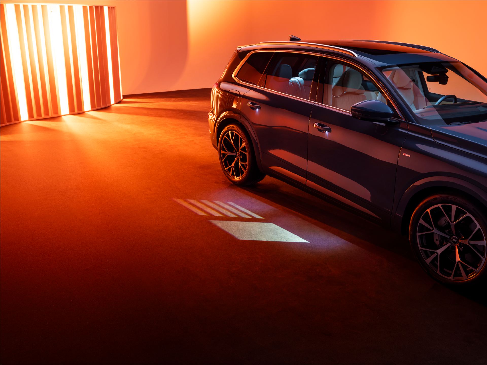2026 audi q7 suv side light projection studio blue