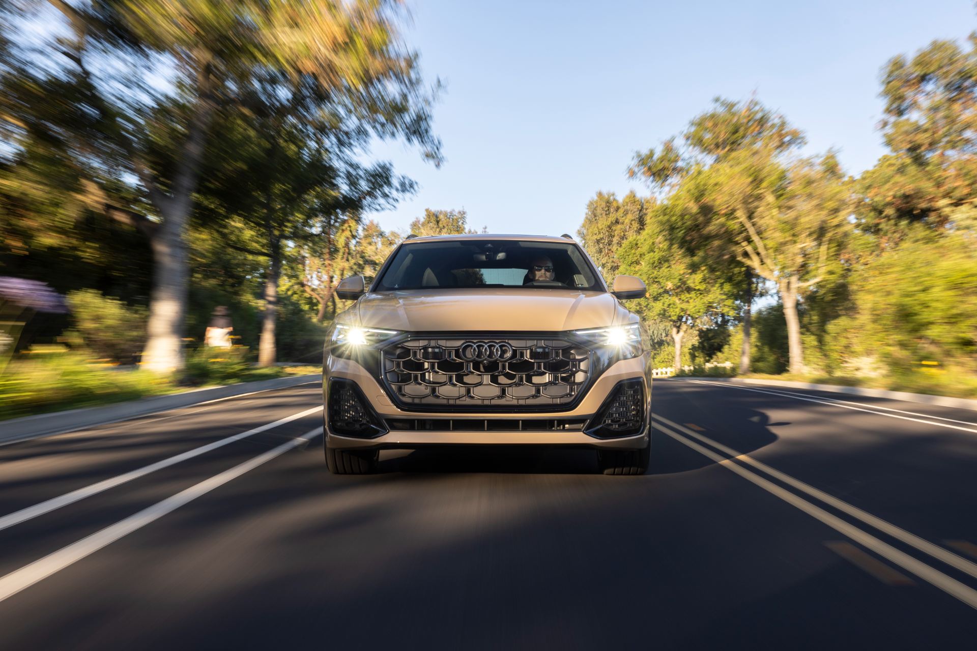 2027 audi q8 driving front avenue beige