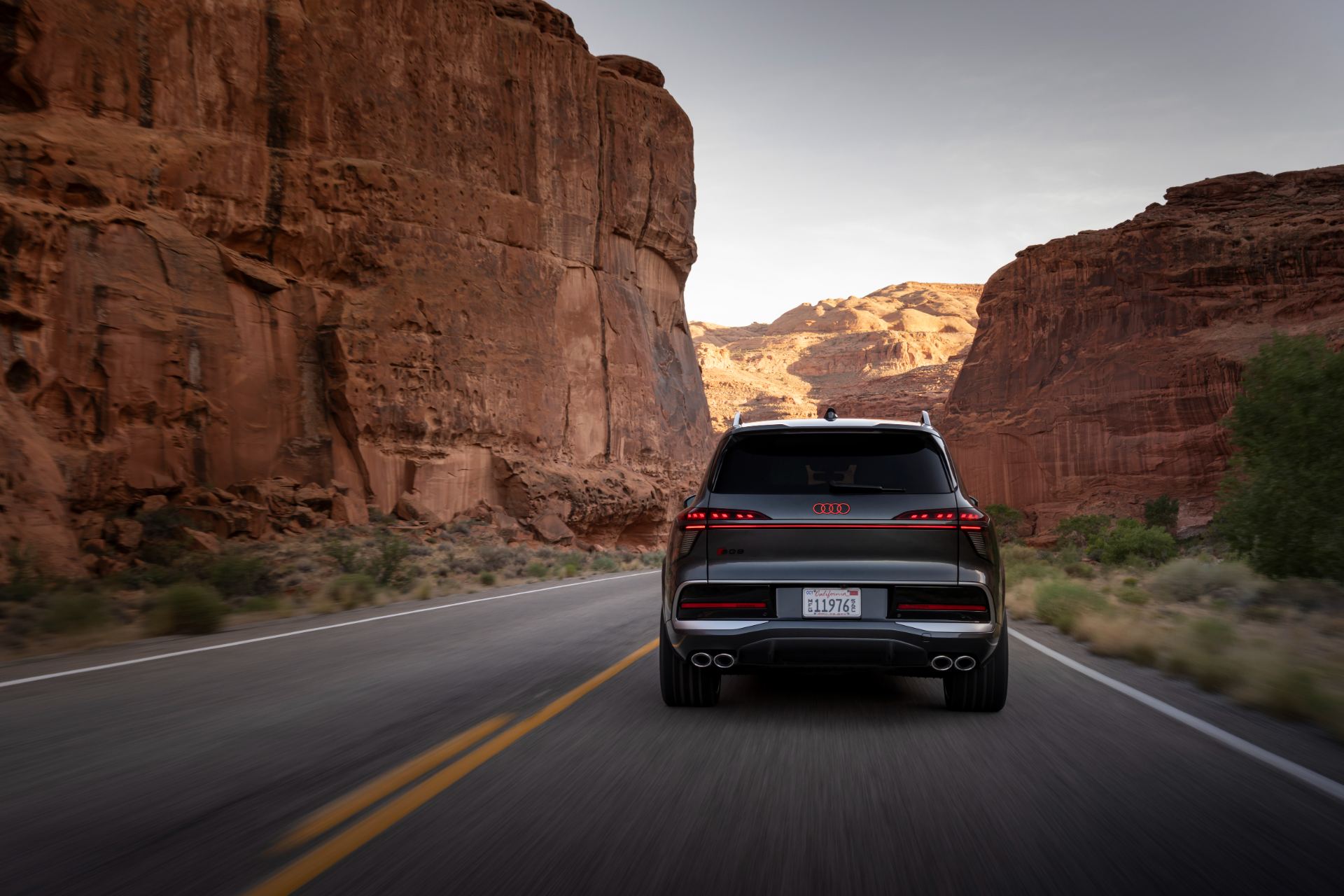 2027 audi q9 driving rear canyon grey