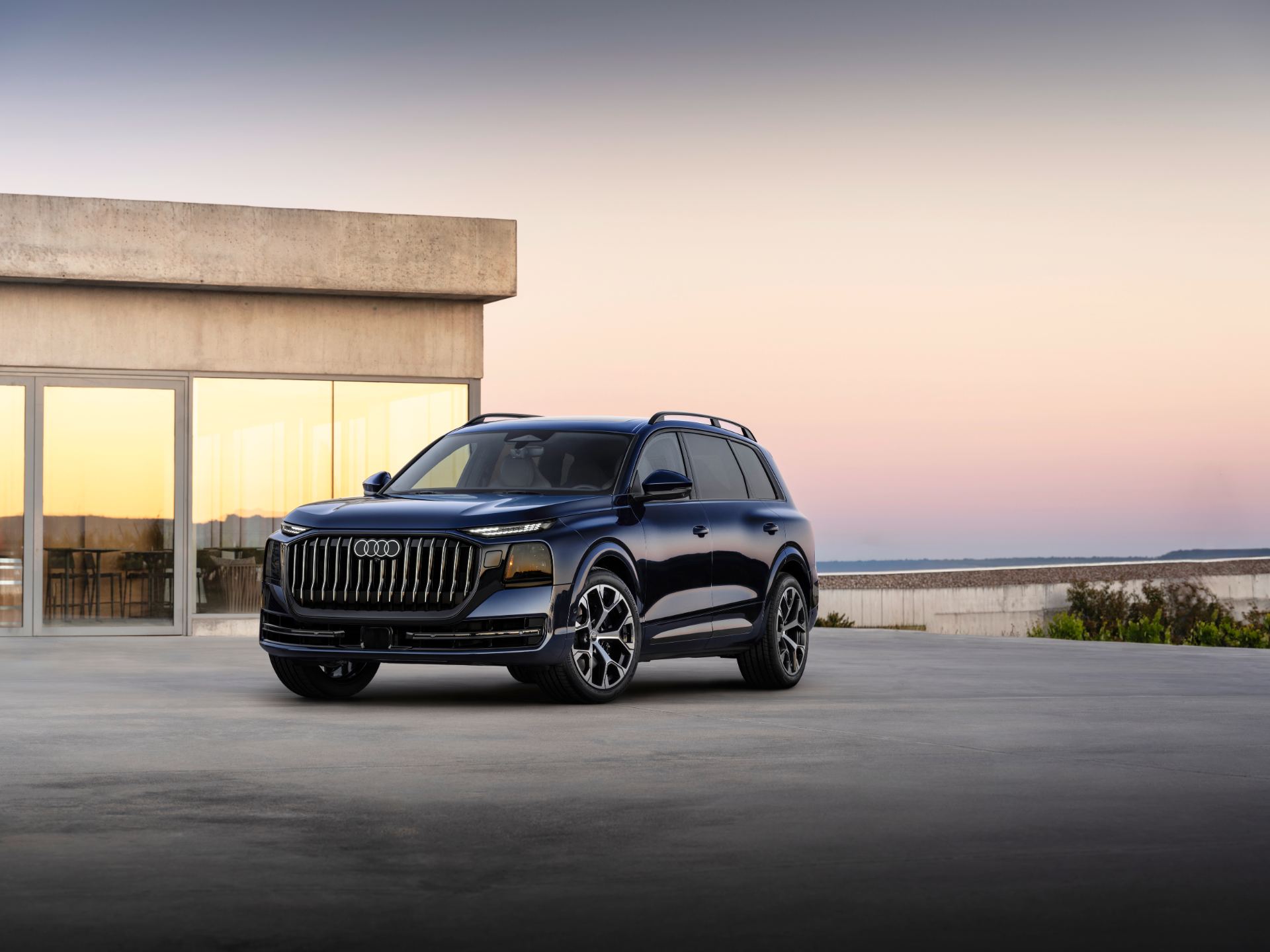 2027 audi q9 front three quarter building blue