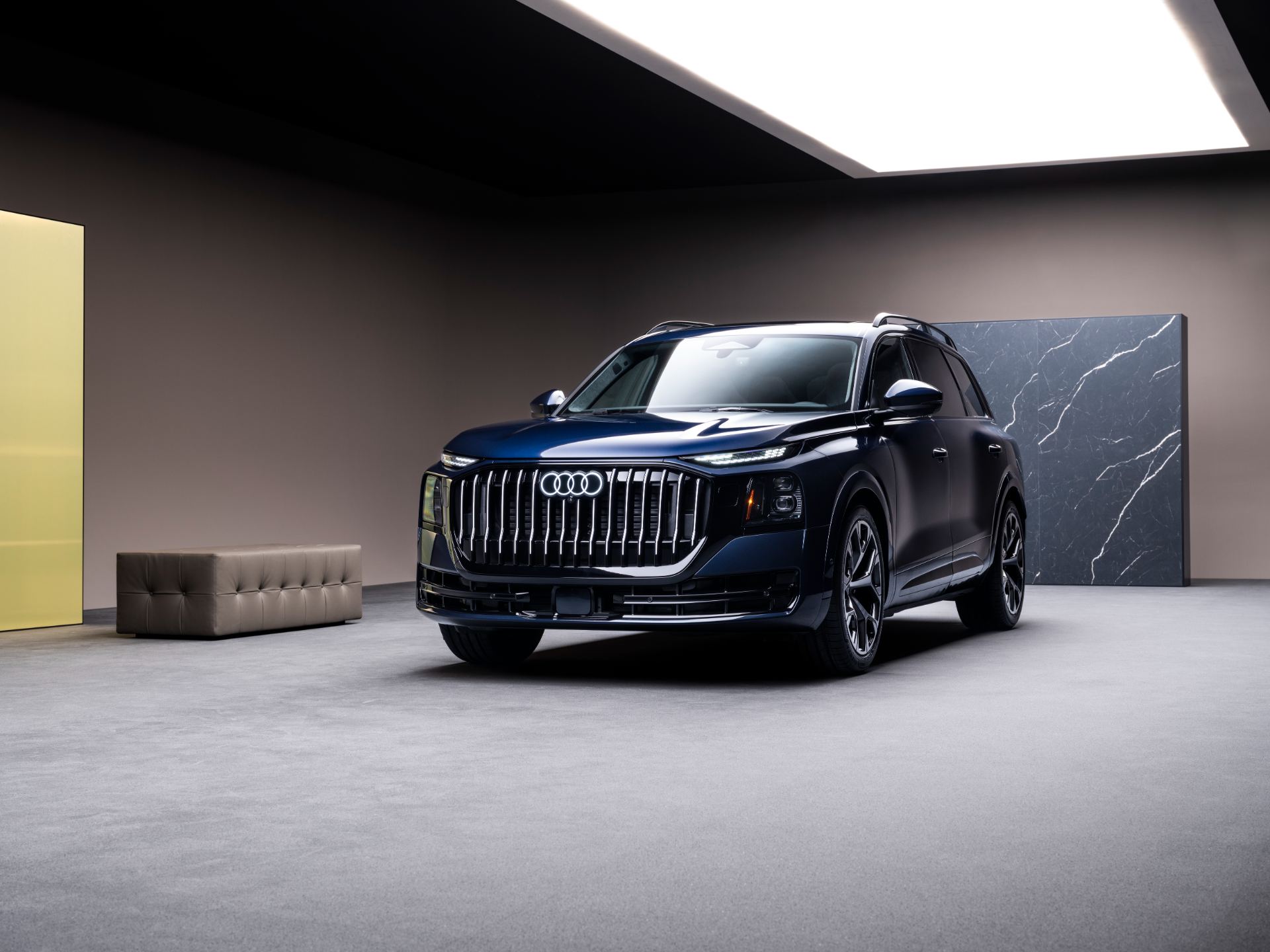 2027 audi q9 front three quarter low angle blue