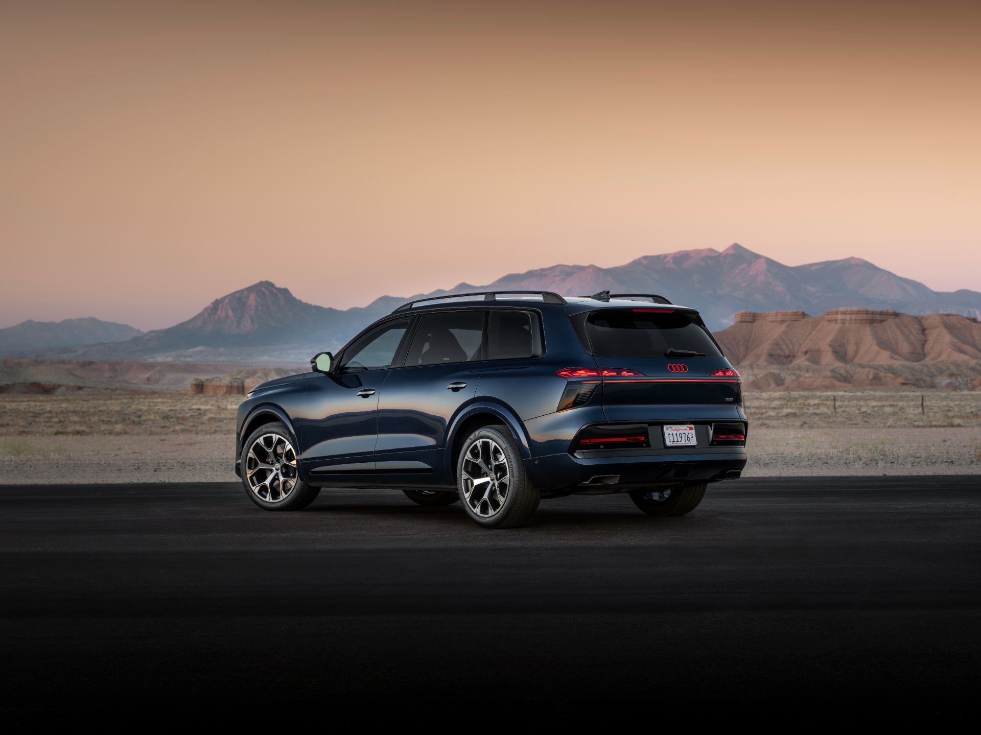 2027 audi q9 rear three quarter desert blue