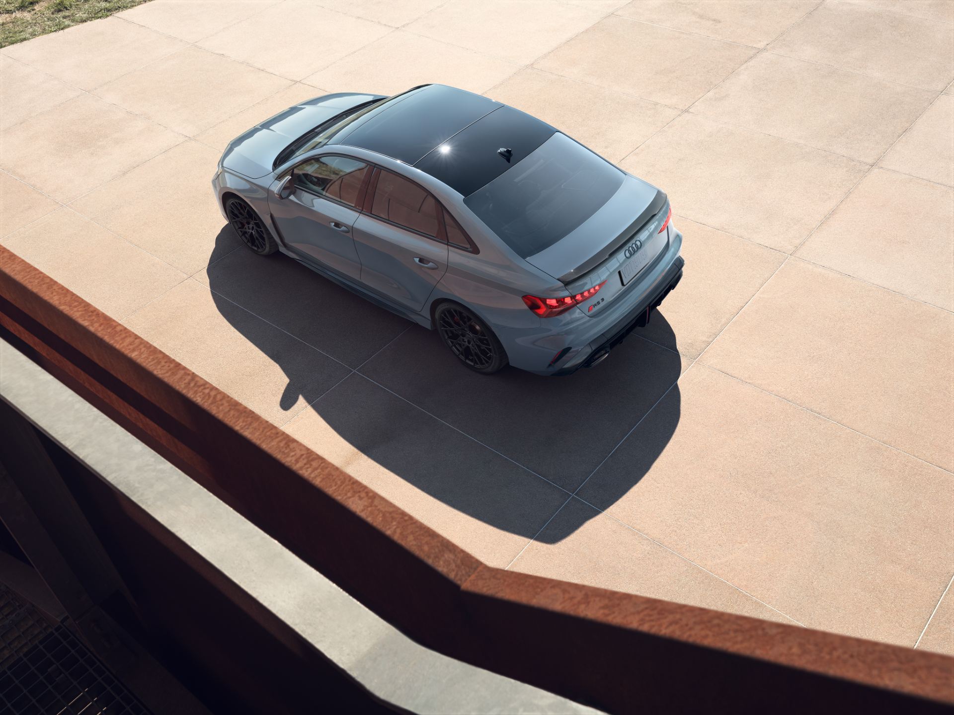 2027 audi rs 3 overhead rear three quarter grey