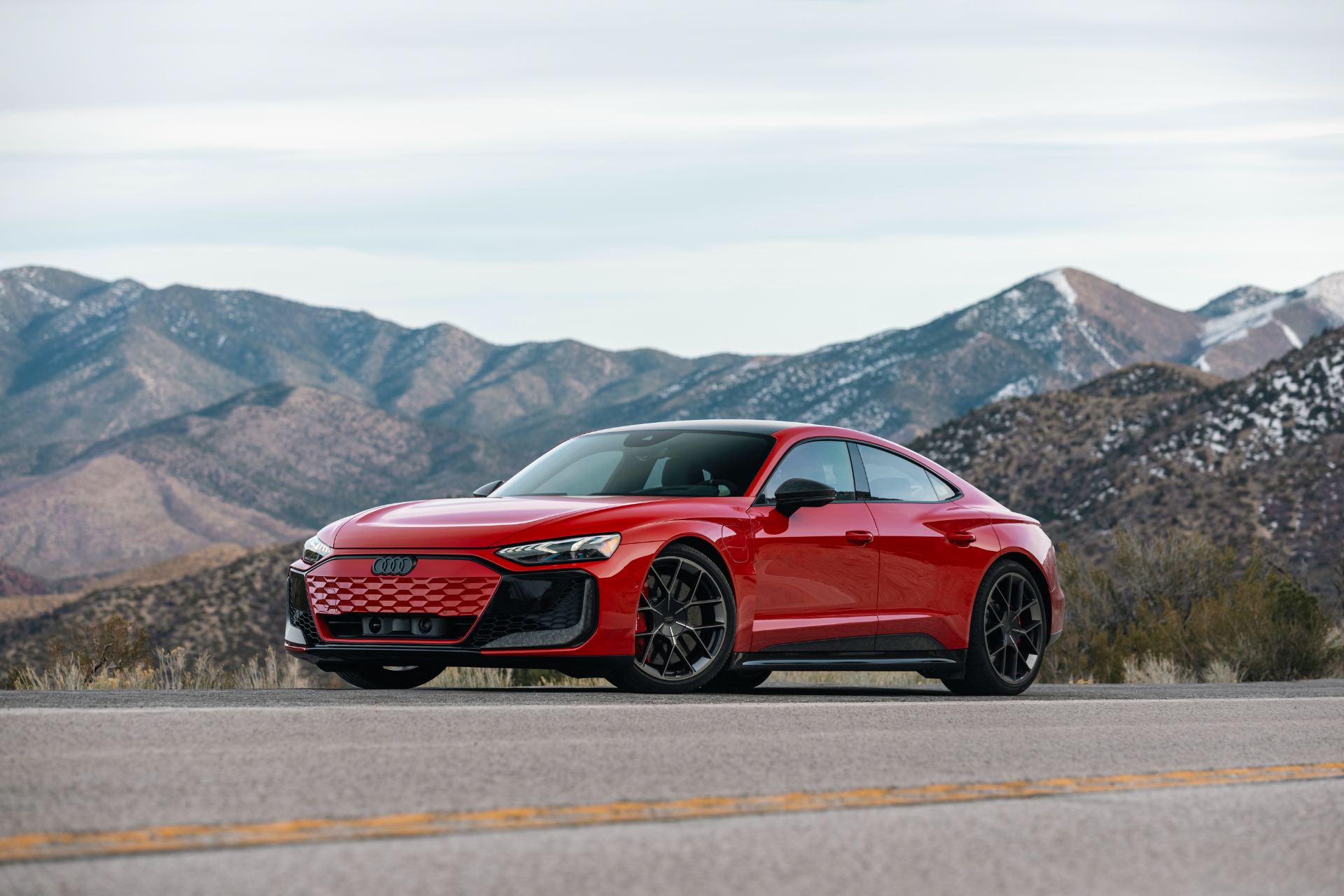 2026 audi rs e tron gt performance front three quarter mountains red