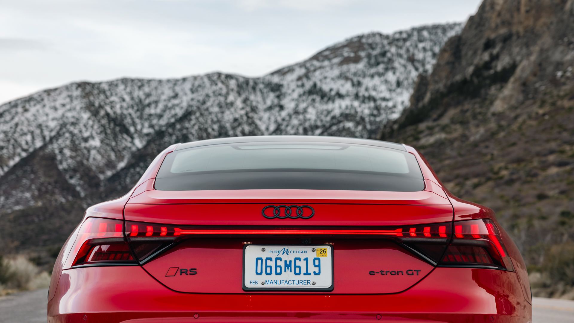 2026 audi rs e tron gt performance rear snowy mountains red