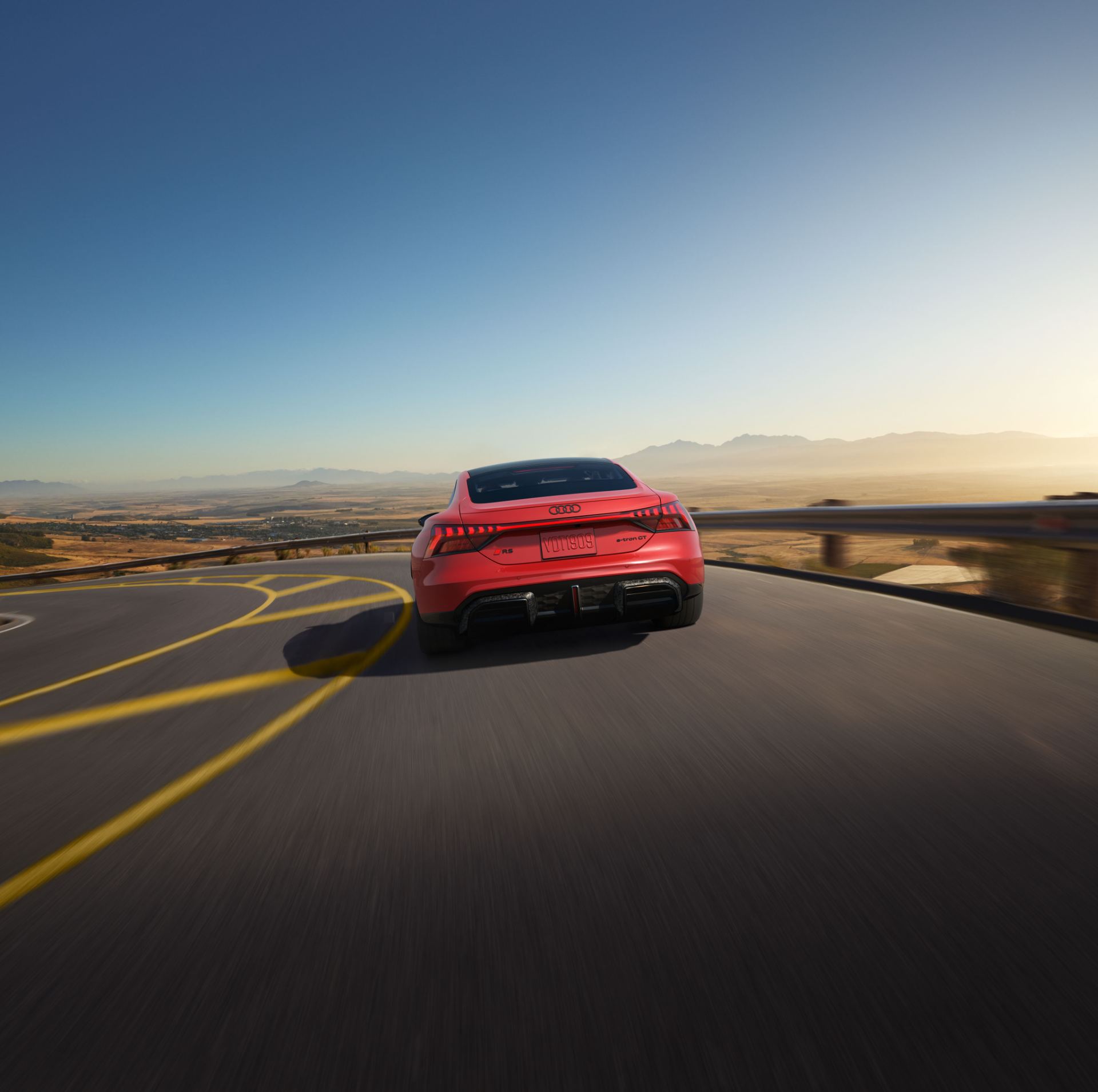 2026 audi rs e tron gt performance driving rear curve road red