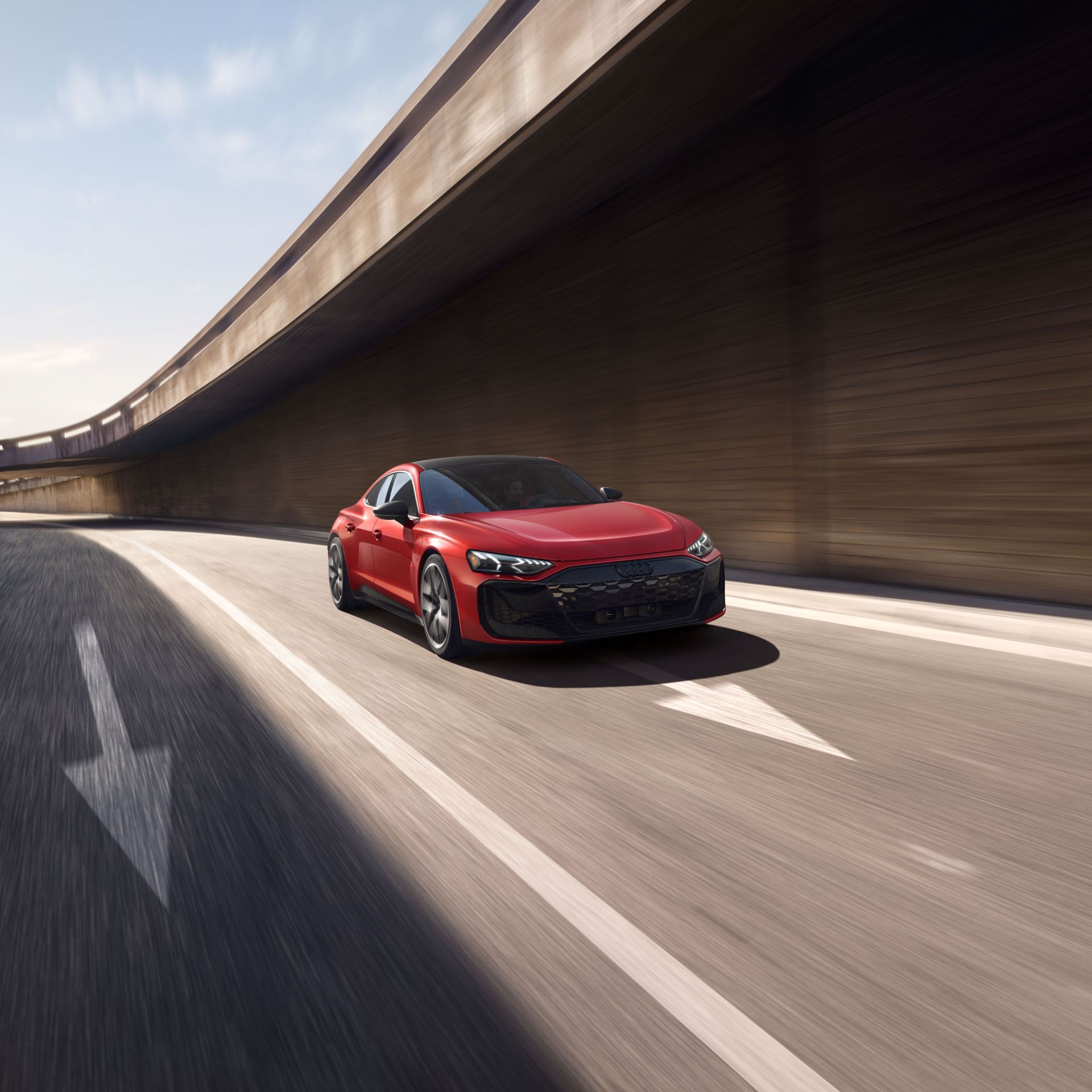 2026 audi rs e tron gt performance driving front three quarter underpass red