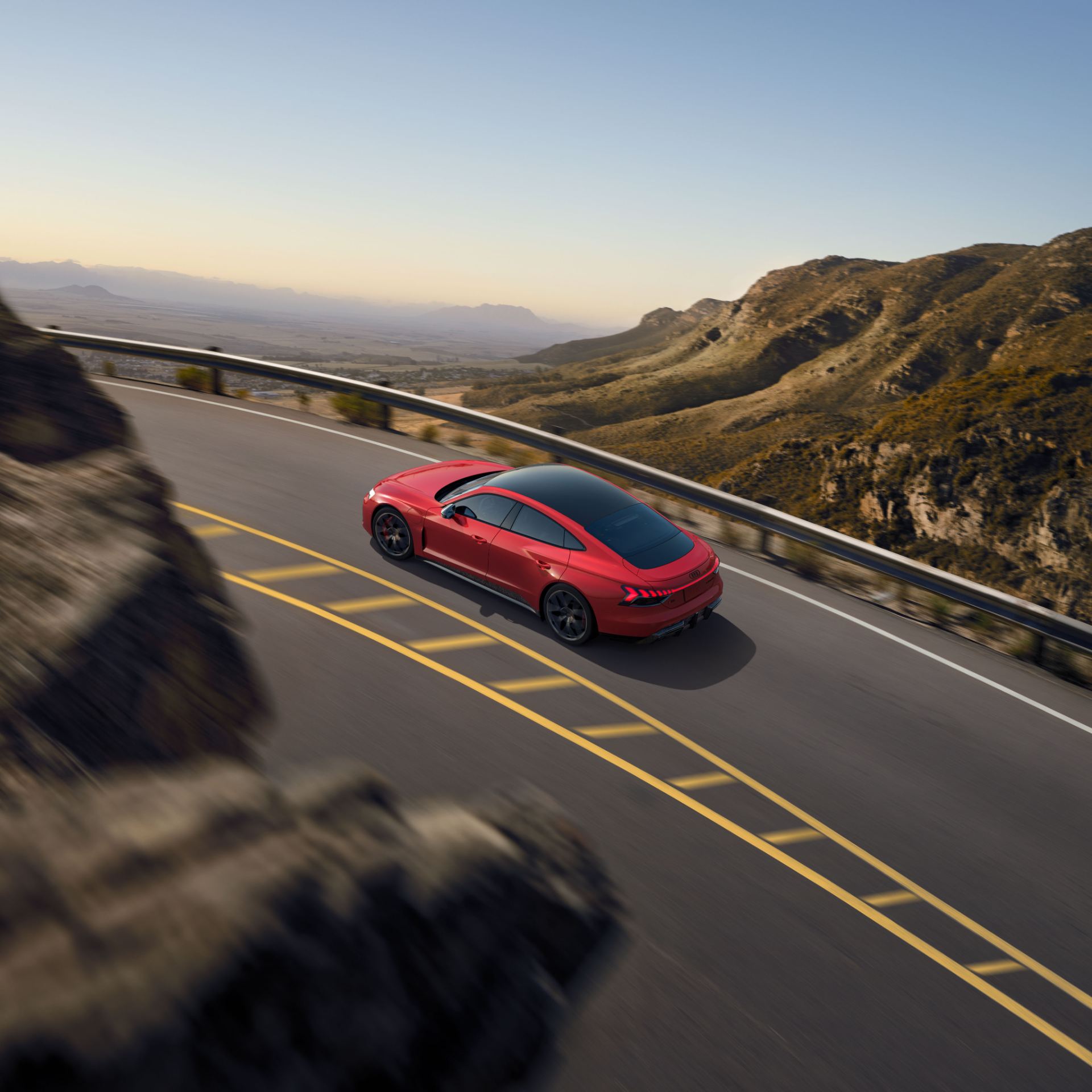 2026 audi rs e tron gt performance driving high angle mountain road red