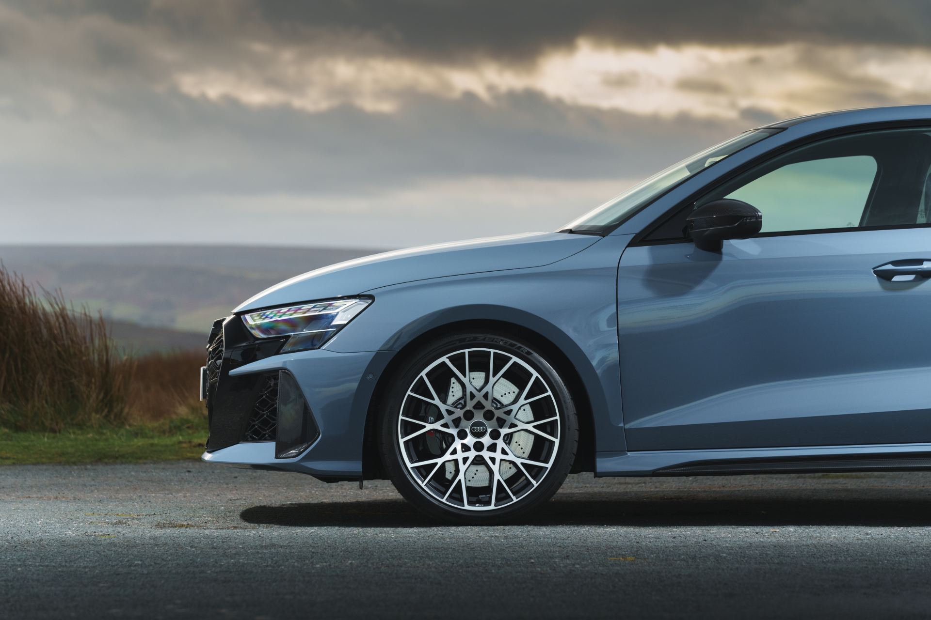 2025 audi rs 3 front quarter side view grey