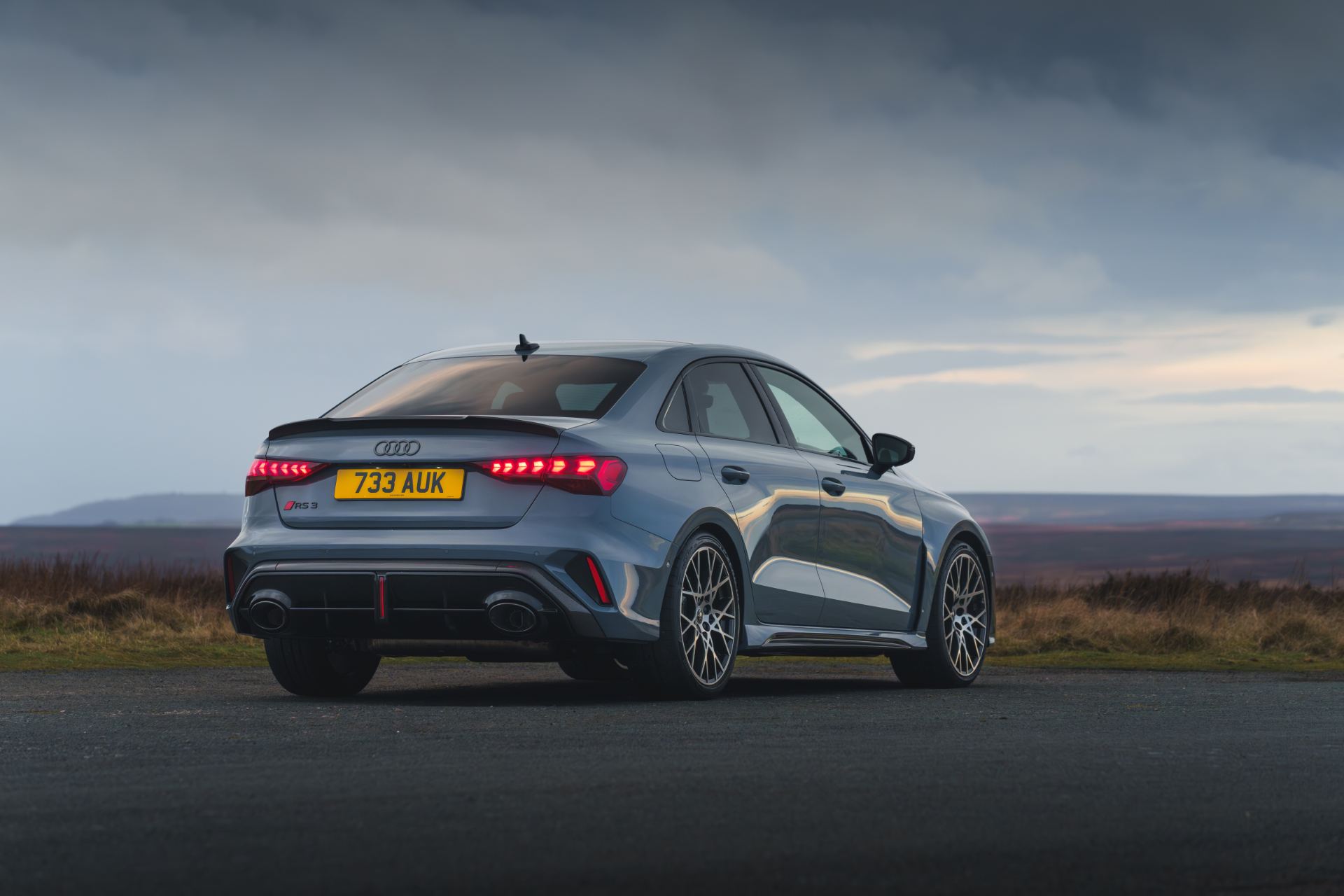 2025 audi rs 3 saloon rear three quarter moorland grey