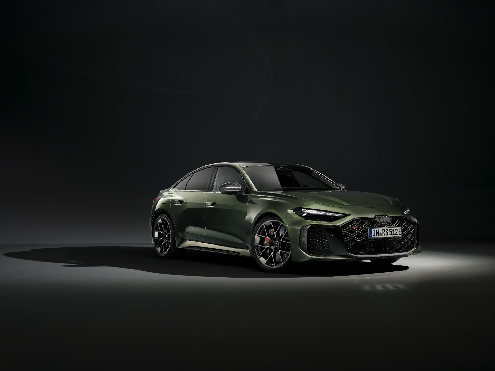 2026 audi rs 5 front three quarter studio green
