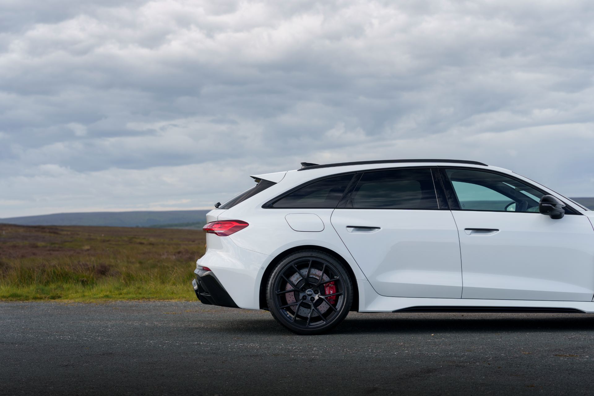 2026 audi rs 5 avant side rear quarter white