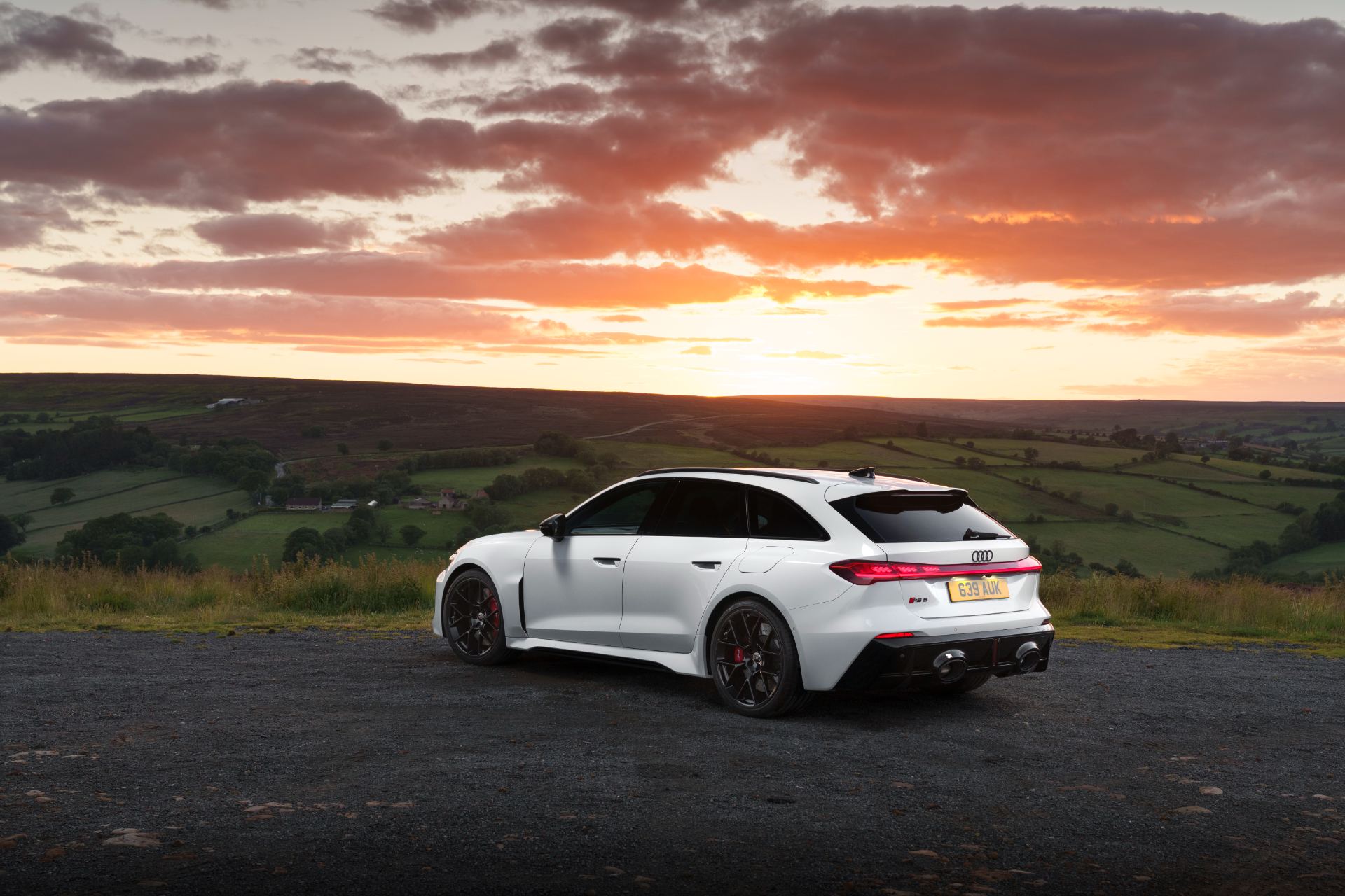 2026 audi rs 5 avant rear three quarter sunset white