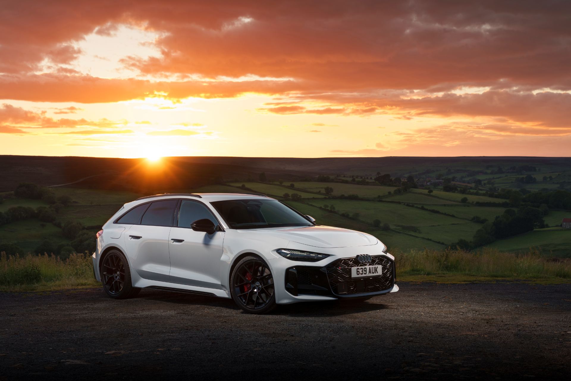 2026 audi rs 5 avant front three quarter sunset white