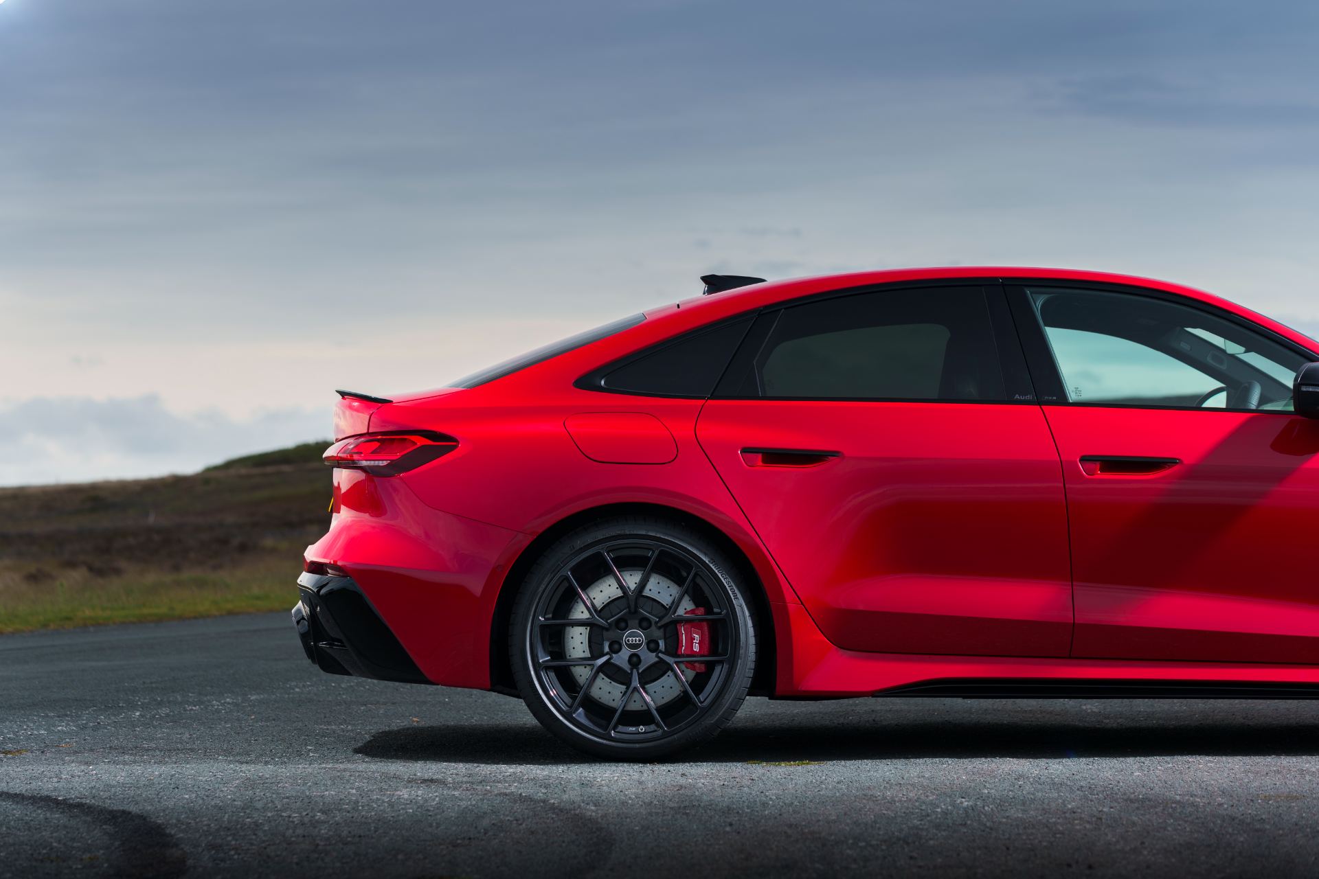 2026 audi rs 5 saloon rear quarter side profile red