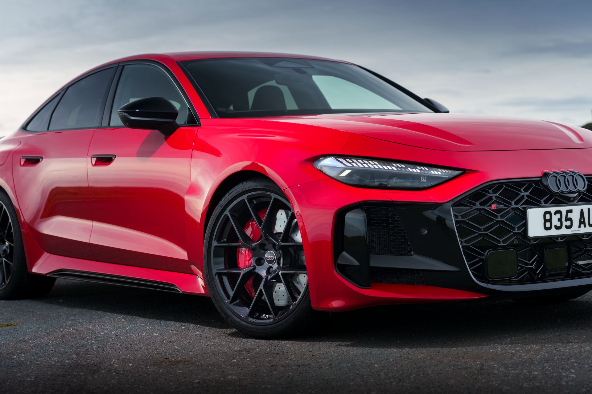 2026 audi rs 5 saloon front three quarter close red