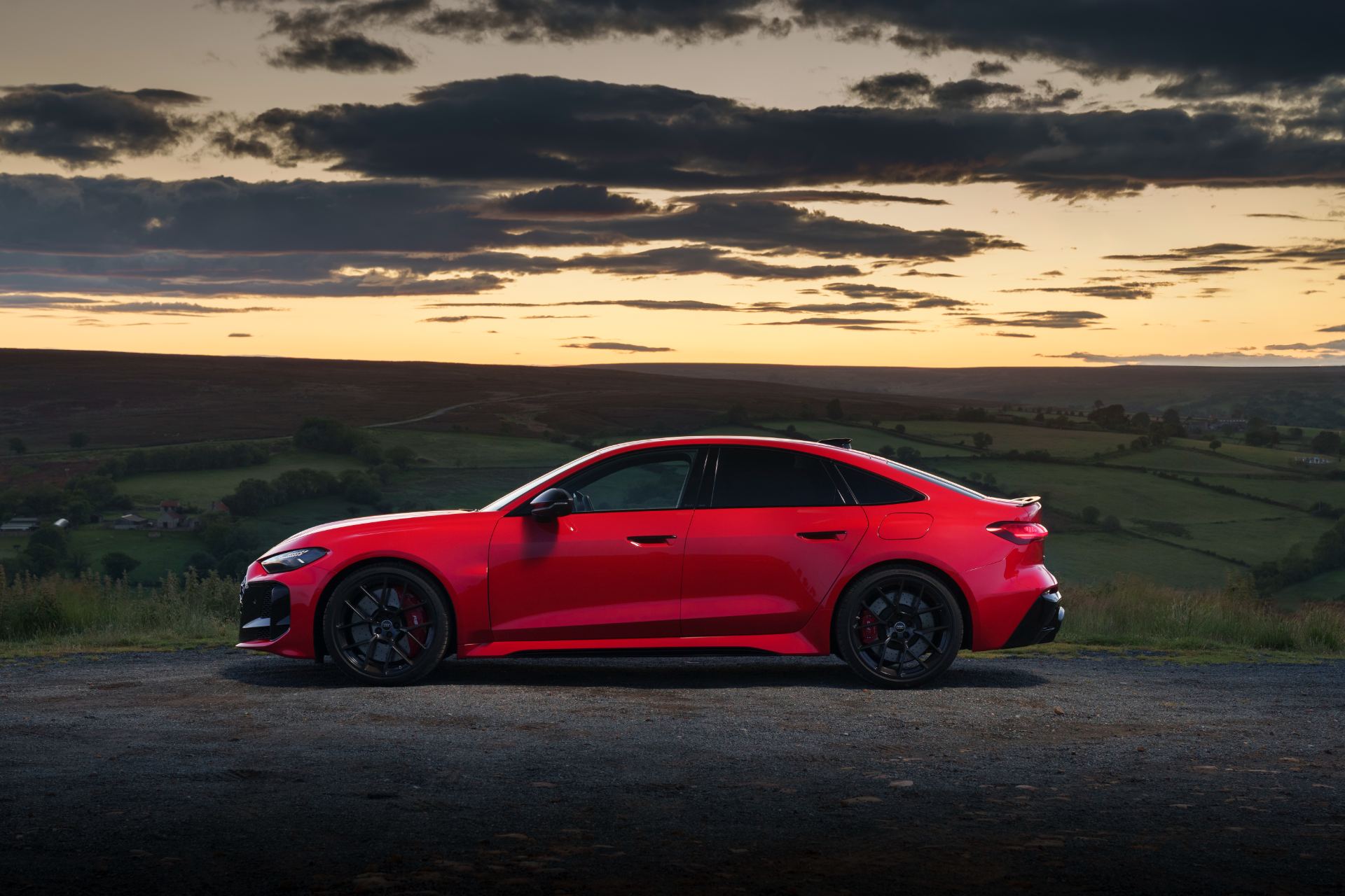 2026 audi rs 5 saloon side profile sunset red