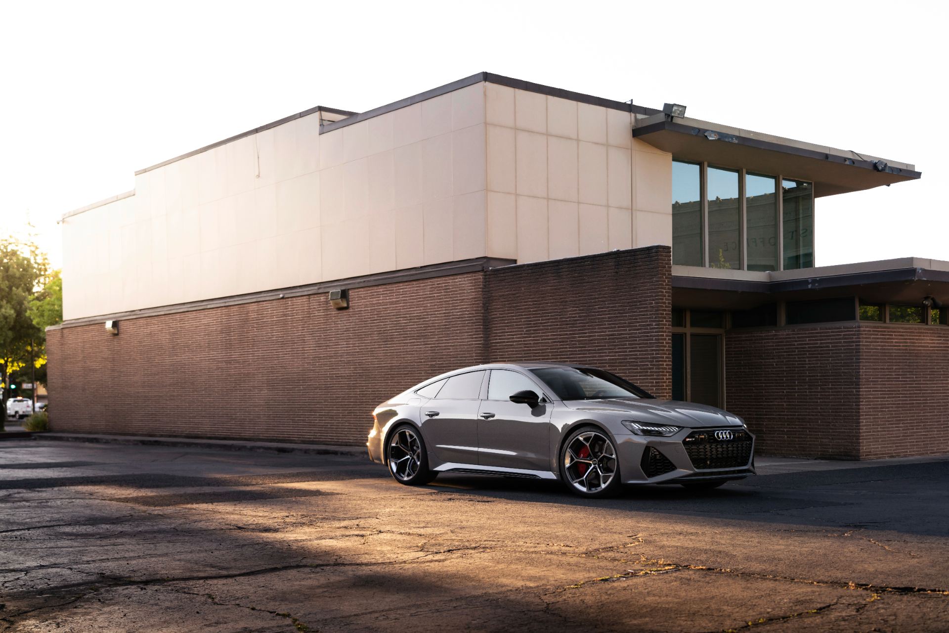 2026 audi rs 7 front three quarter building dusk nardo grey