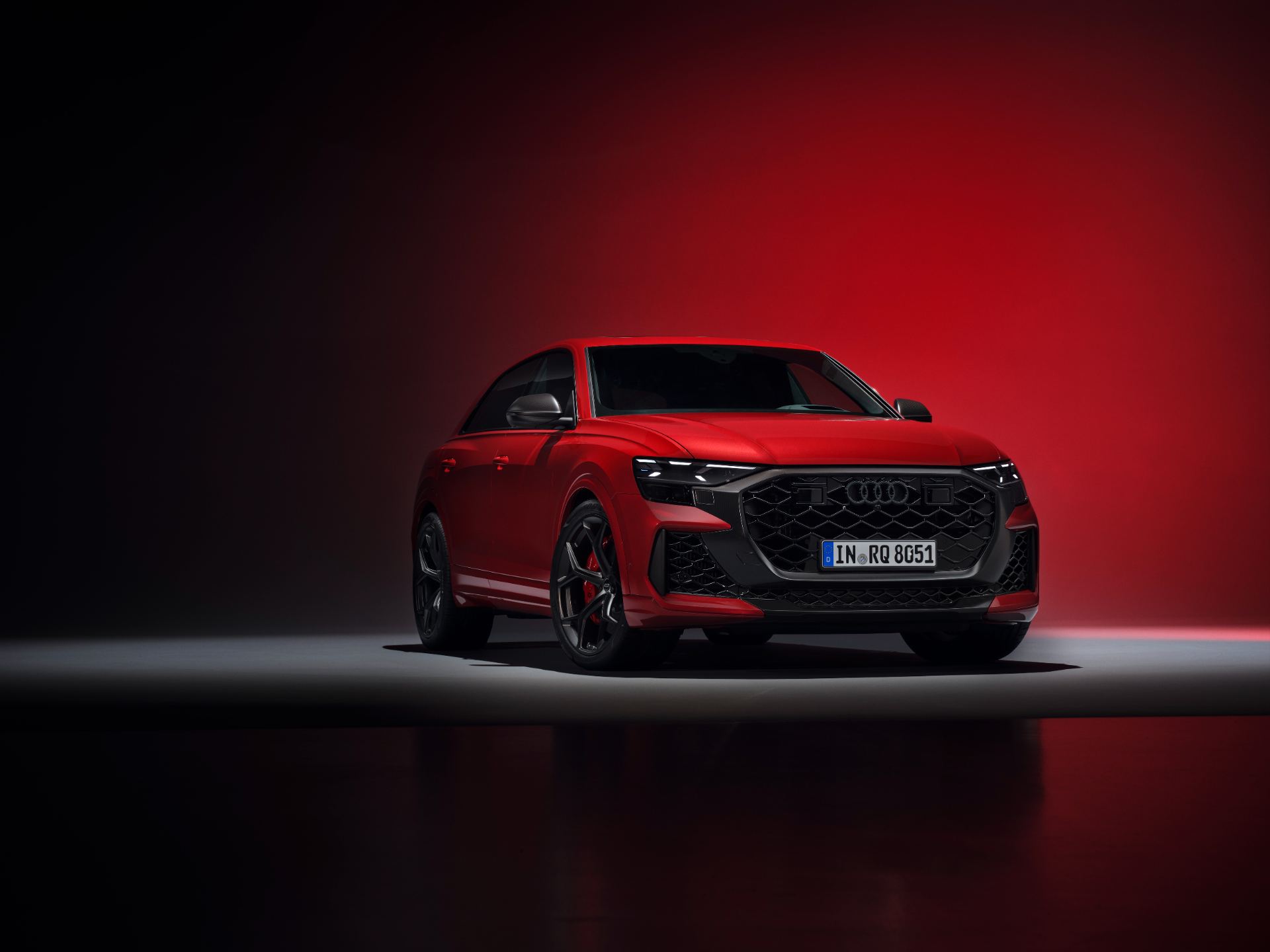 2027 audi rs q8 performance front three quarter studio red