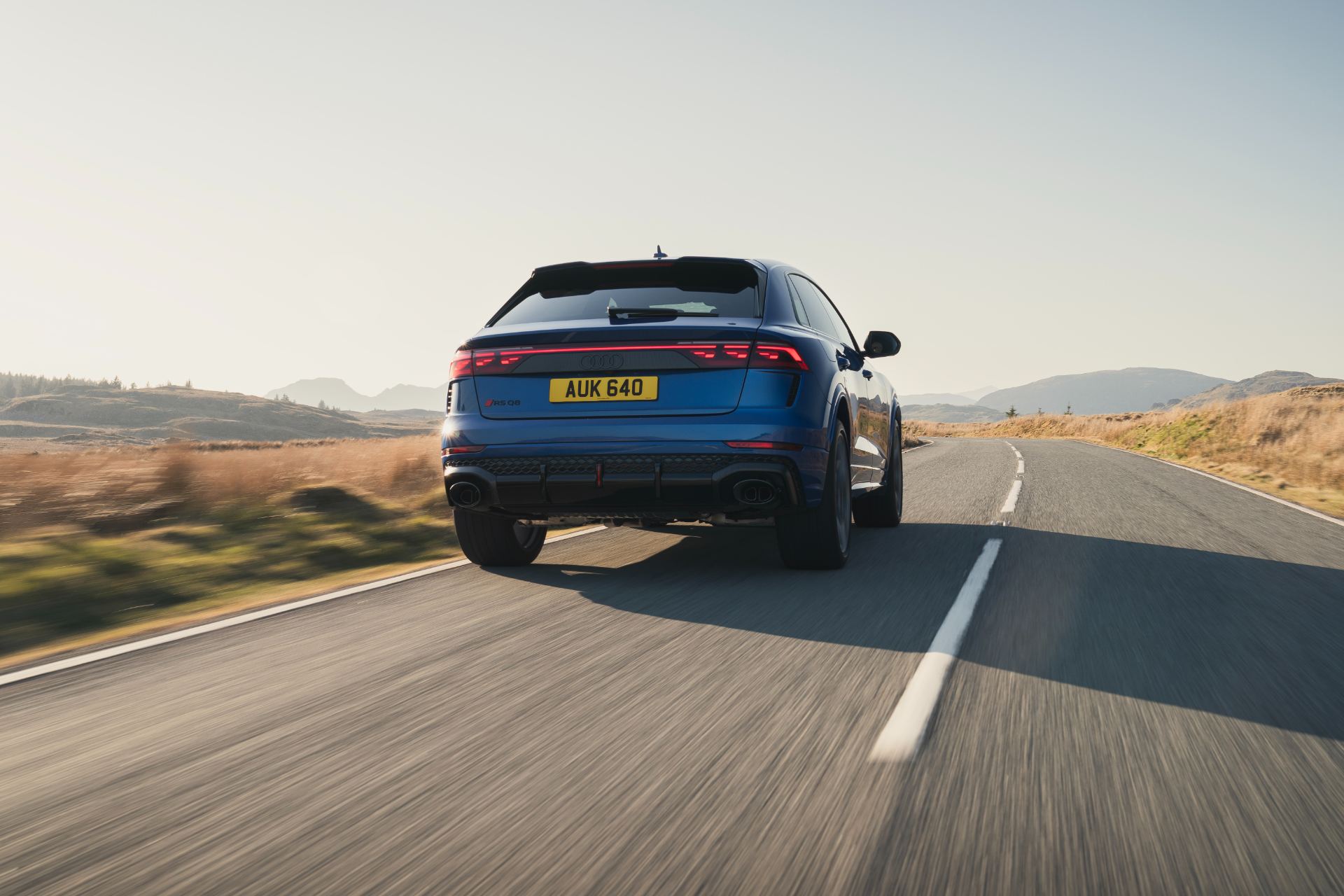 2026 audi rs q8 performance driving rear three quarter blue