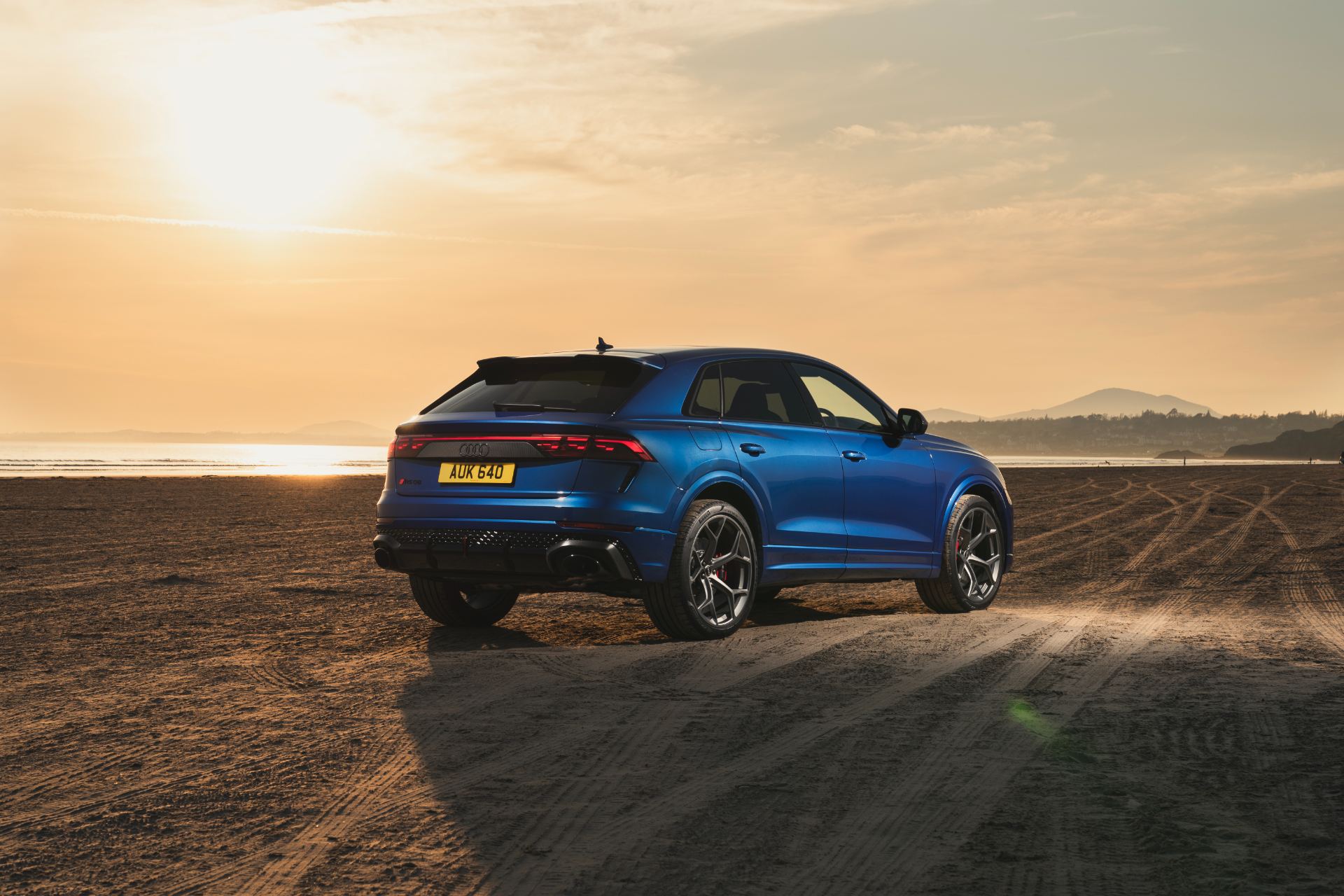 2026 audi rs q8 performance rear three quarter sunset blue
