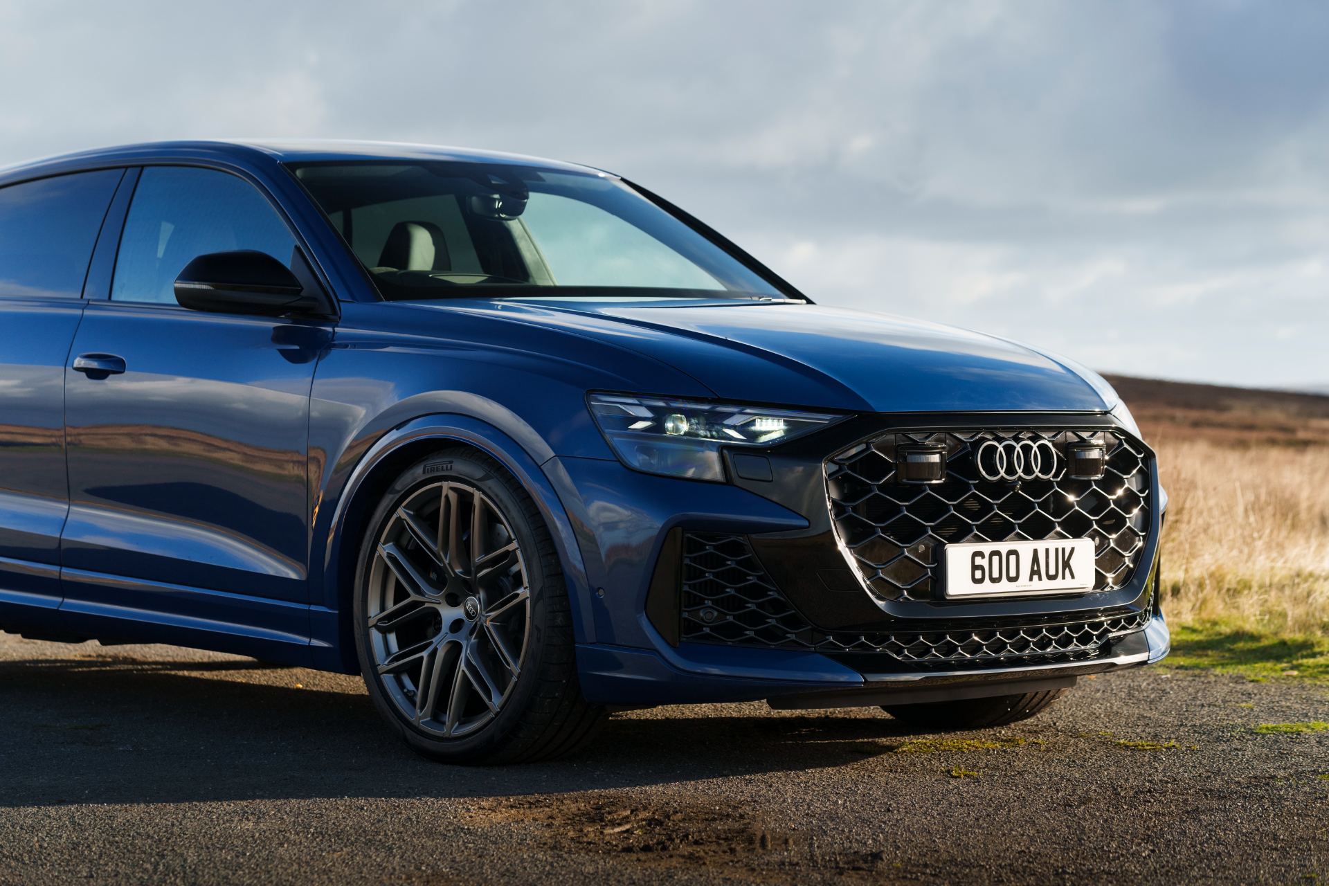 2026 audi rs q8 front three quarter close up blue