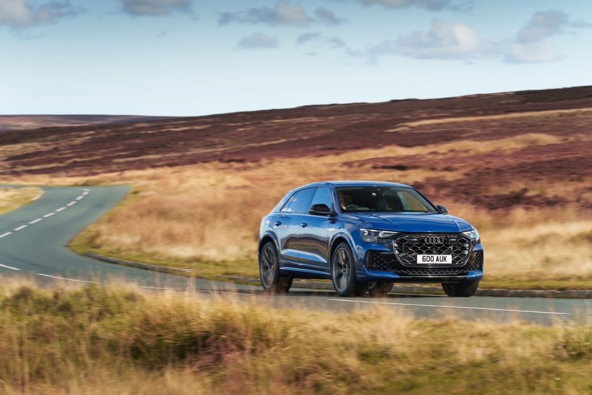 2026 audi rs q8 driving front three quarter moorland blue