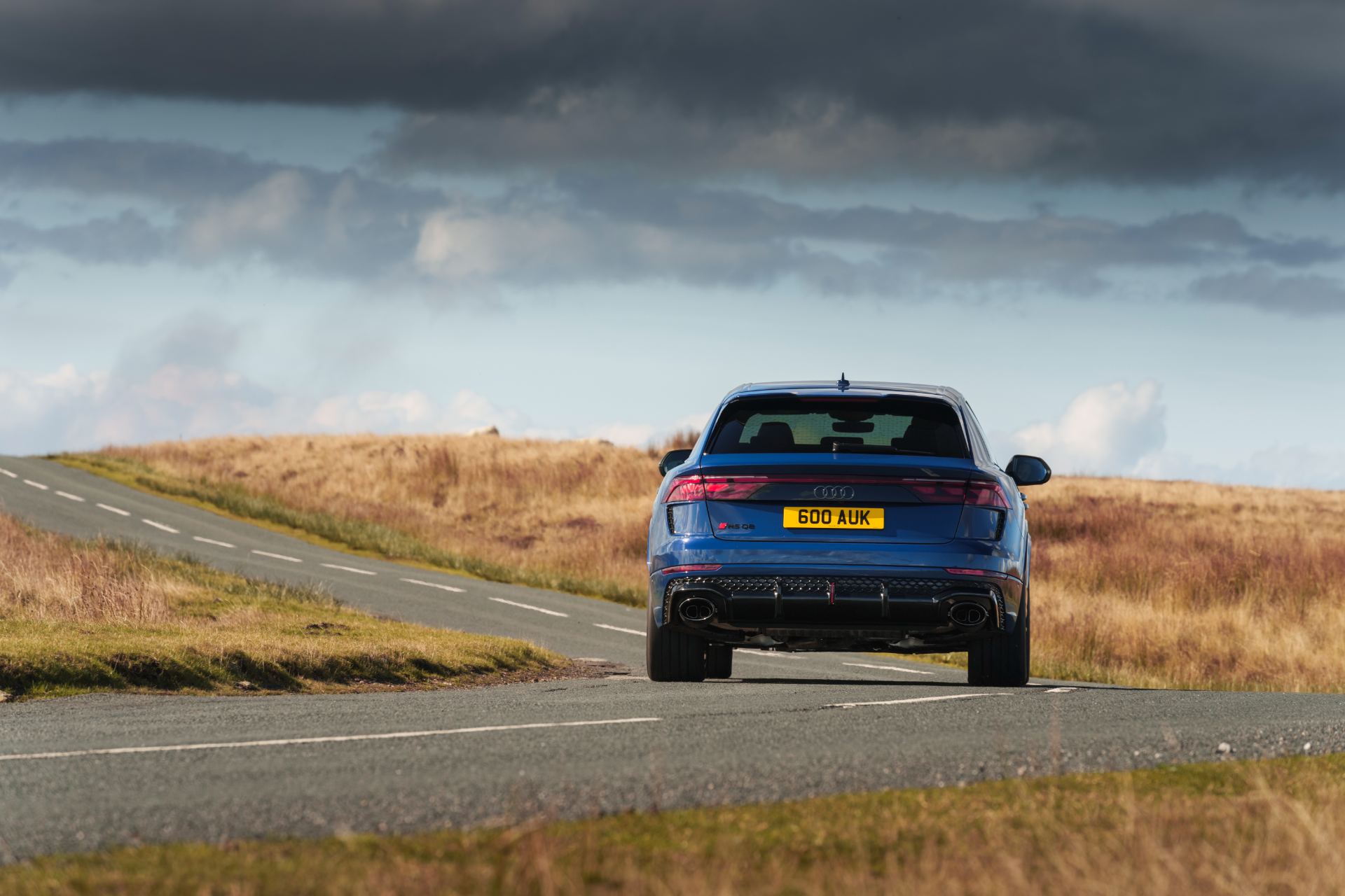 2026 audi rs q8 driving rear blue