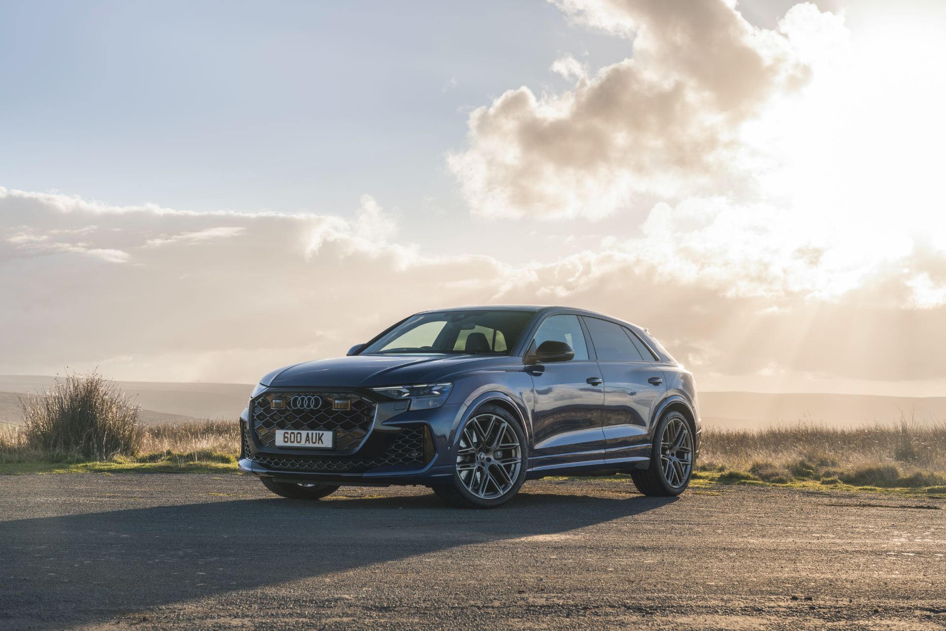 2026 audi rs q8 front three quarter sunlight blue