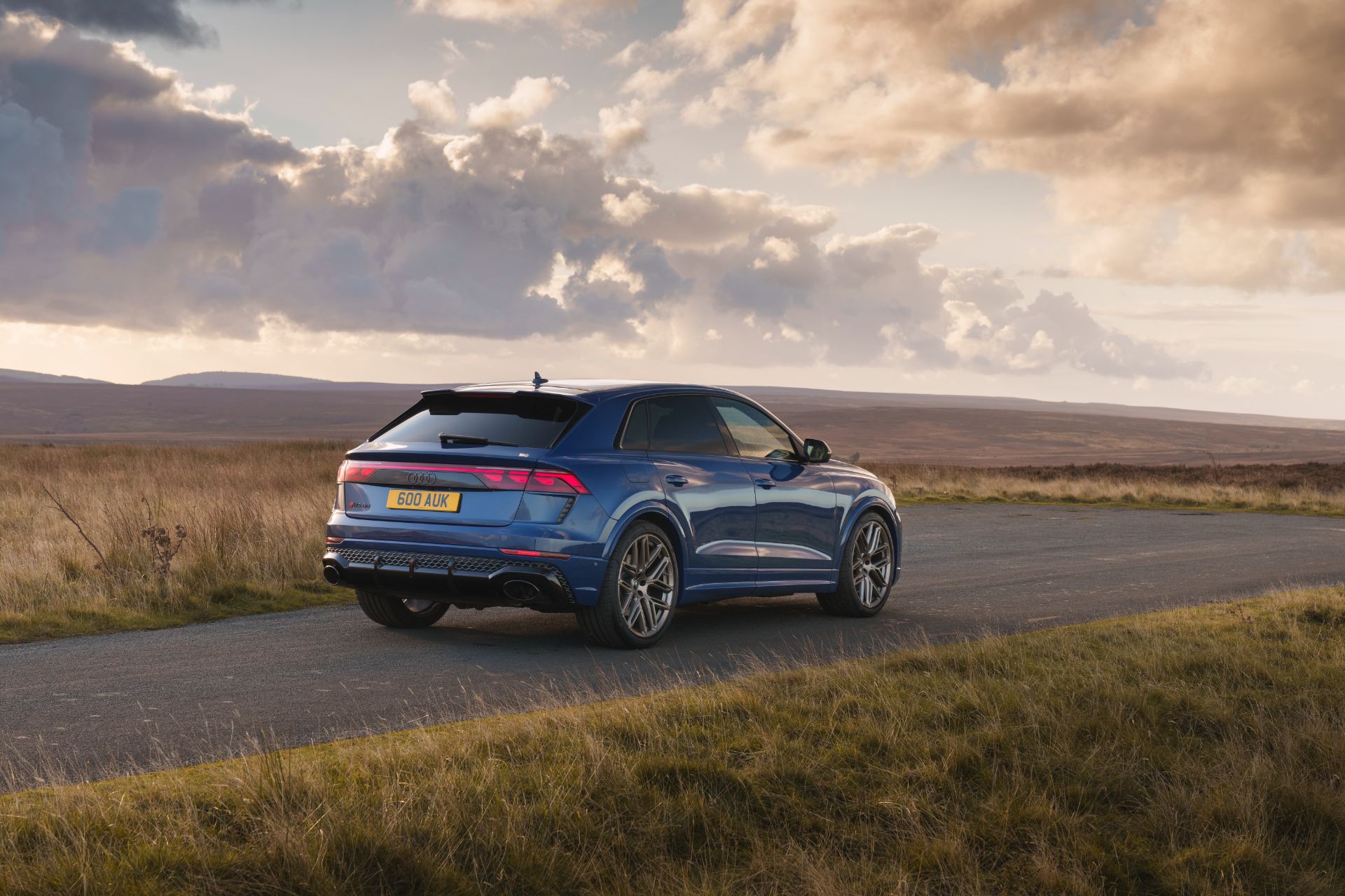 2026 audi rs q8 rear three quarter sunset blue