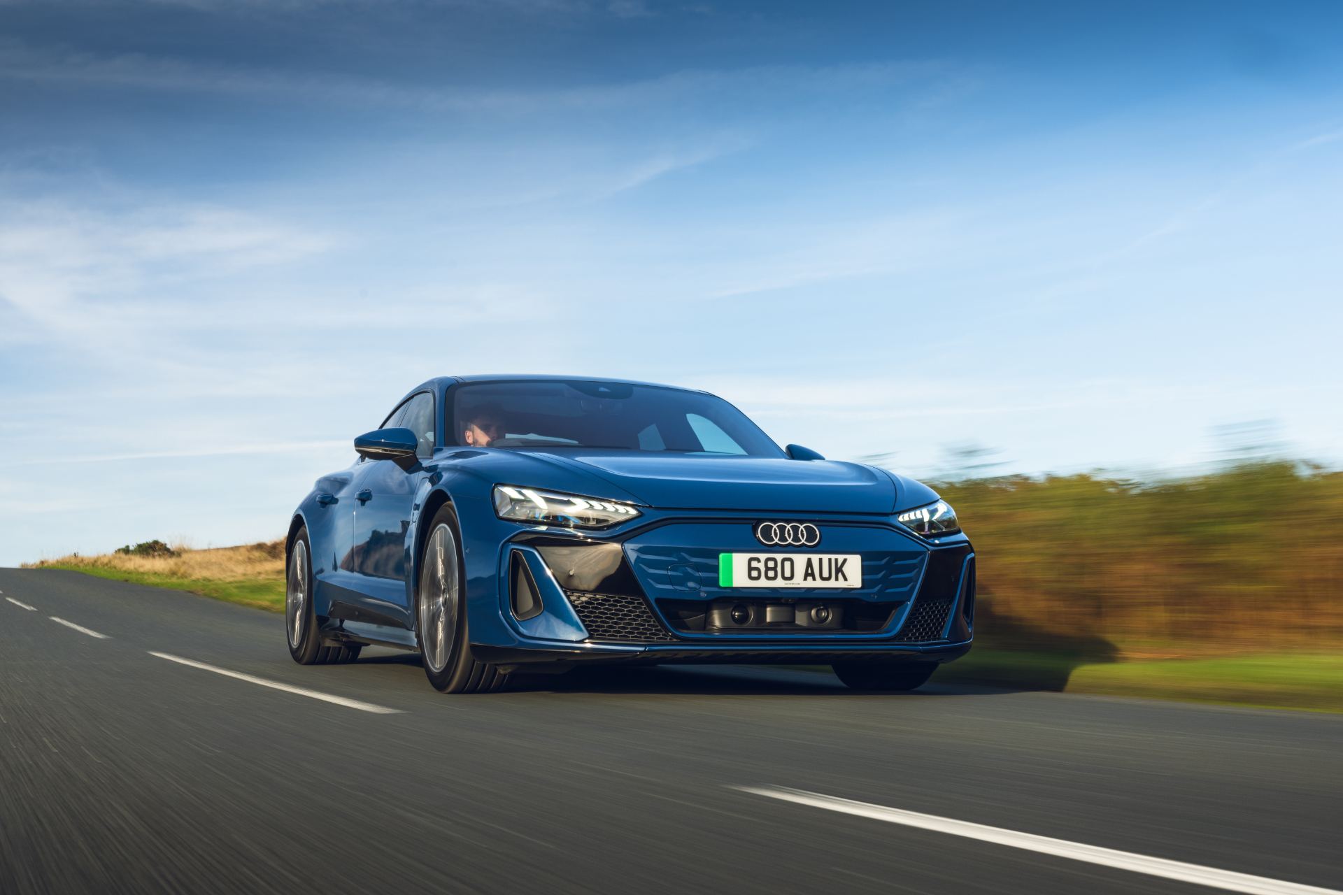 2026 audi s e tron gt quattro driving front three quarter road blue