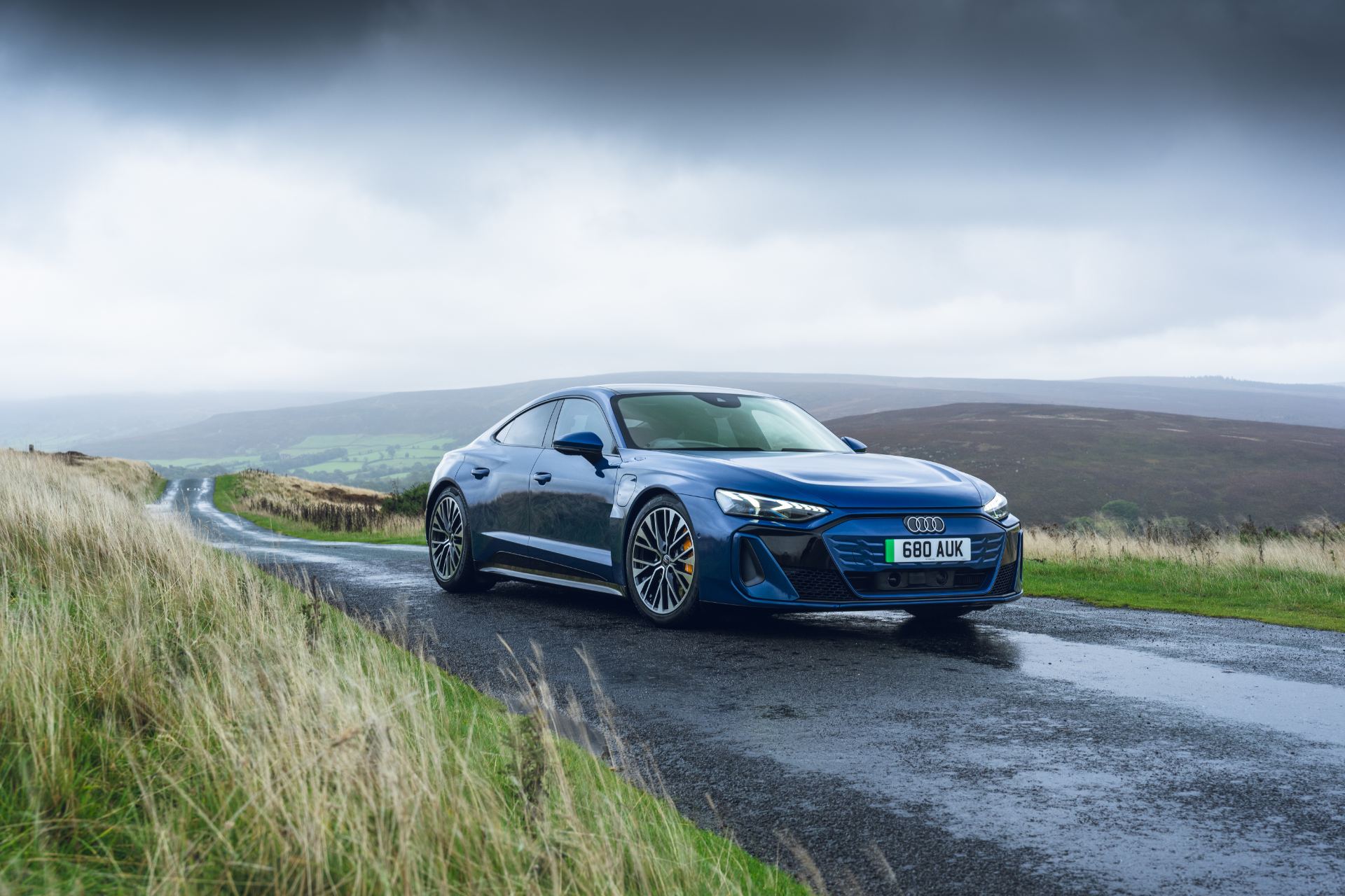 2026 audi s e tron gt quattro front three quarter wet road blue