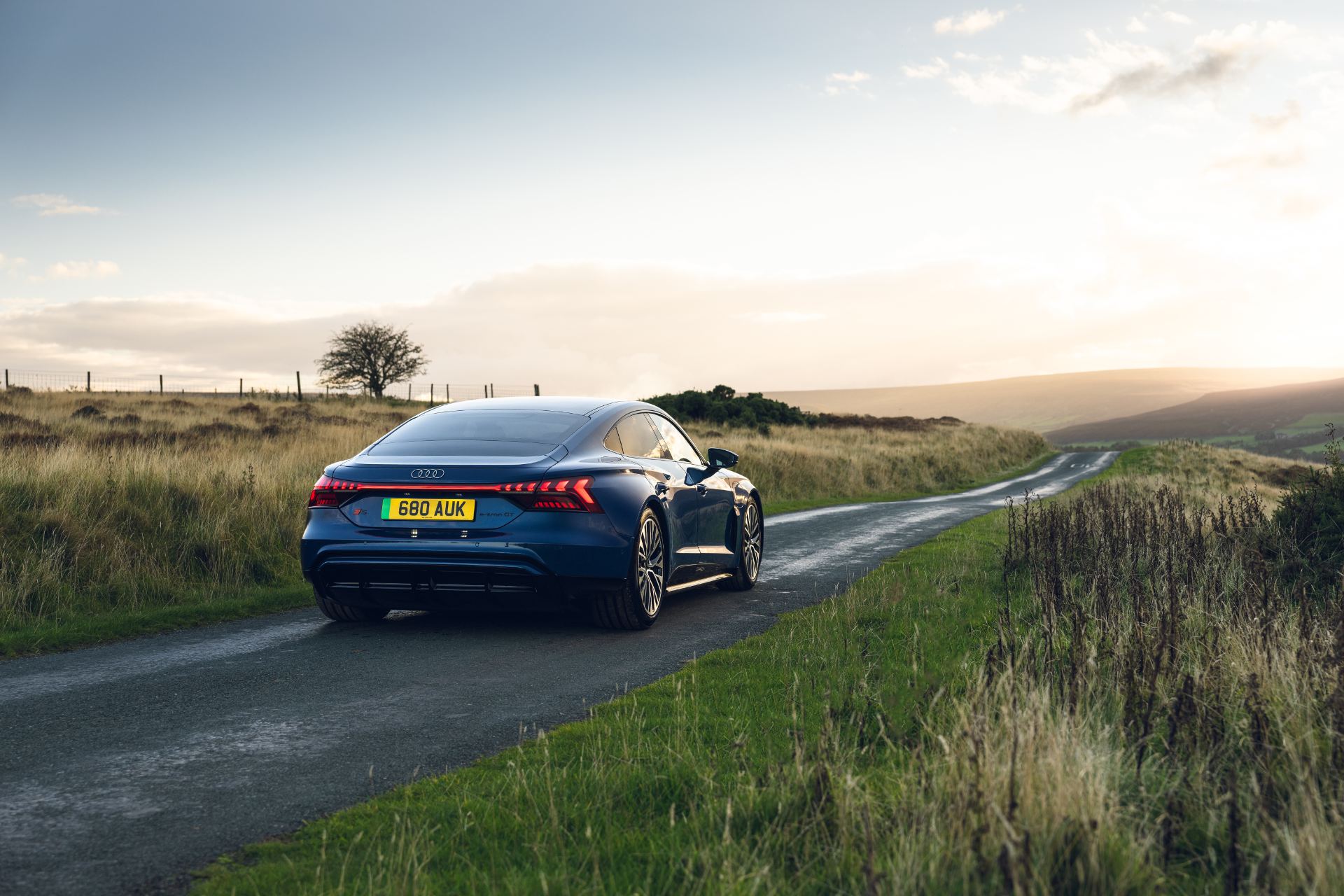 2026 audi s e tron gt quattro rear three quarter sunset blue