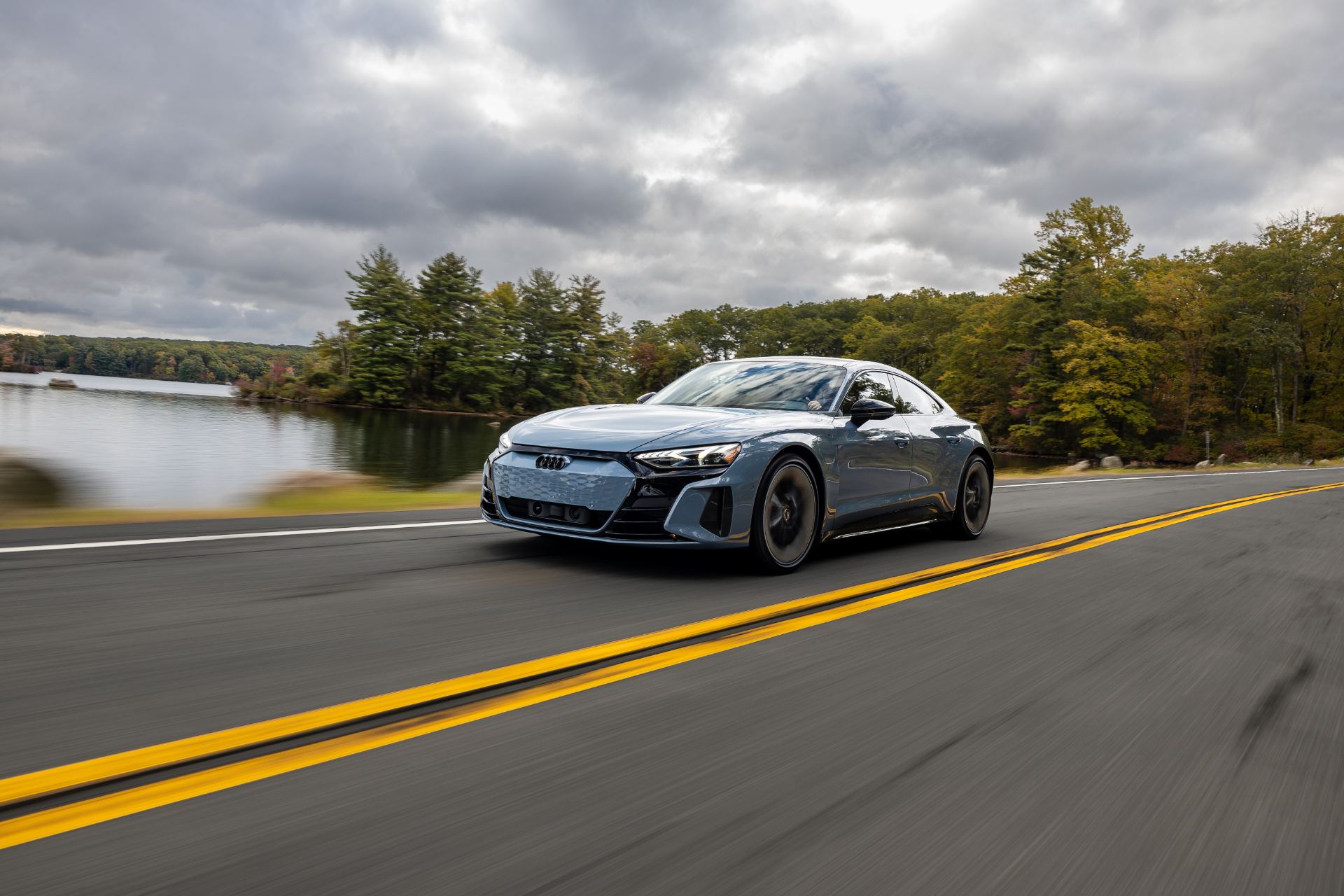 2026 audi s e tron gt driving front three quarter lakeside grey