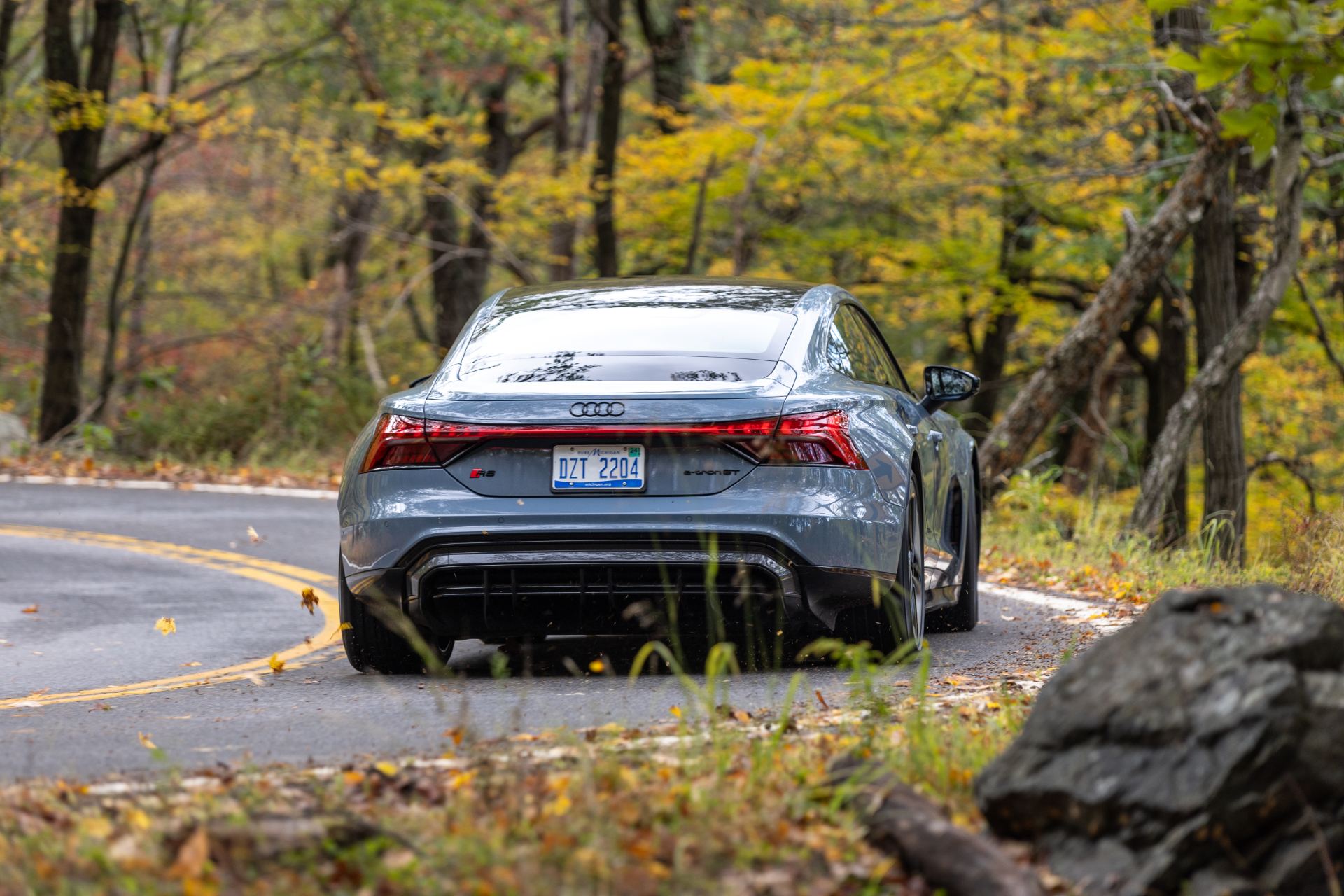 2026 audi s e tron gt driving rear forest bend grey