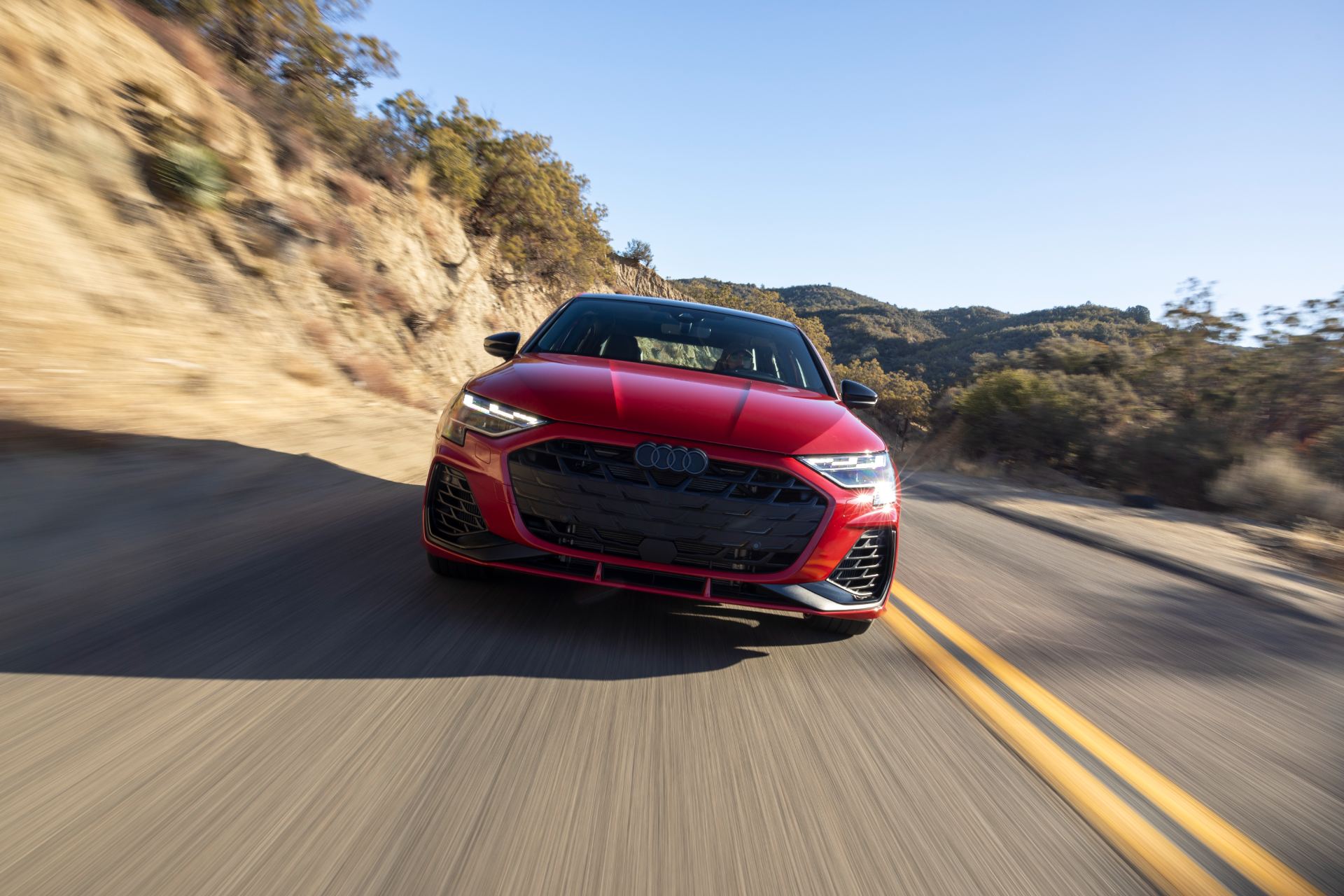 2026 audi s3 driving front canyon road red