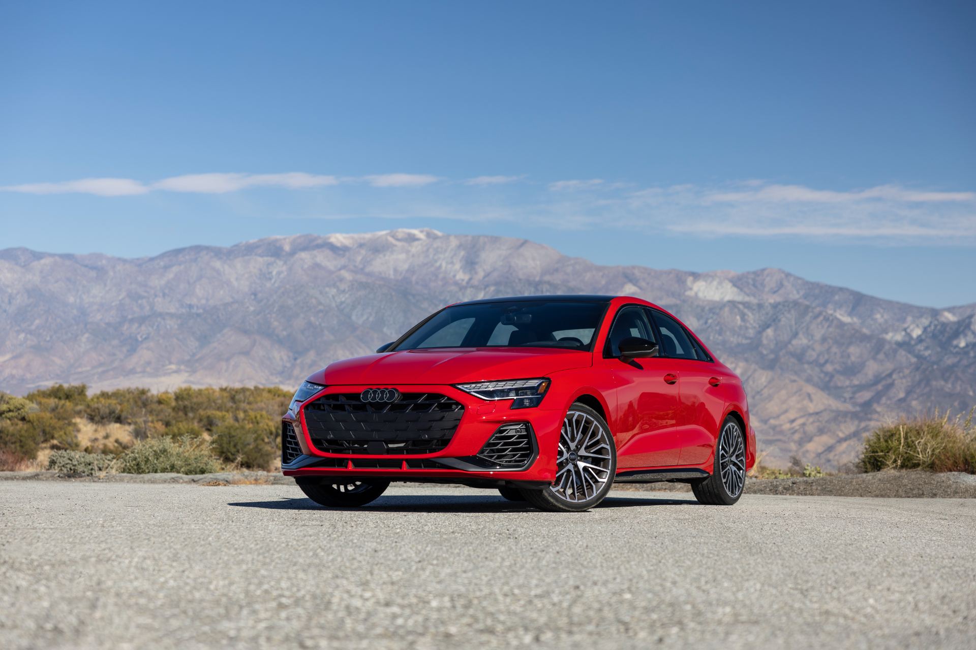 2026 audi s3 front three quarter mountains red