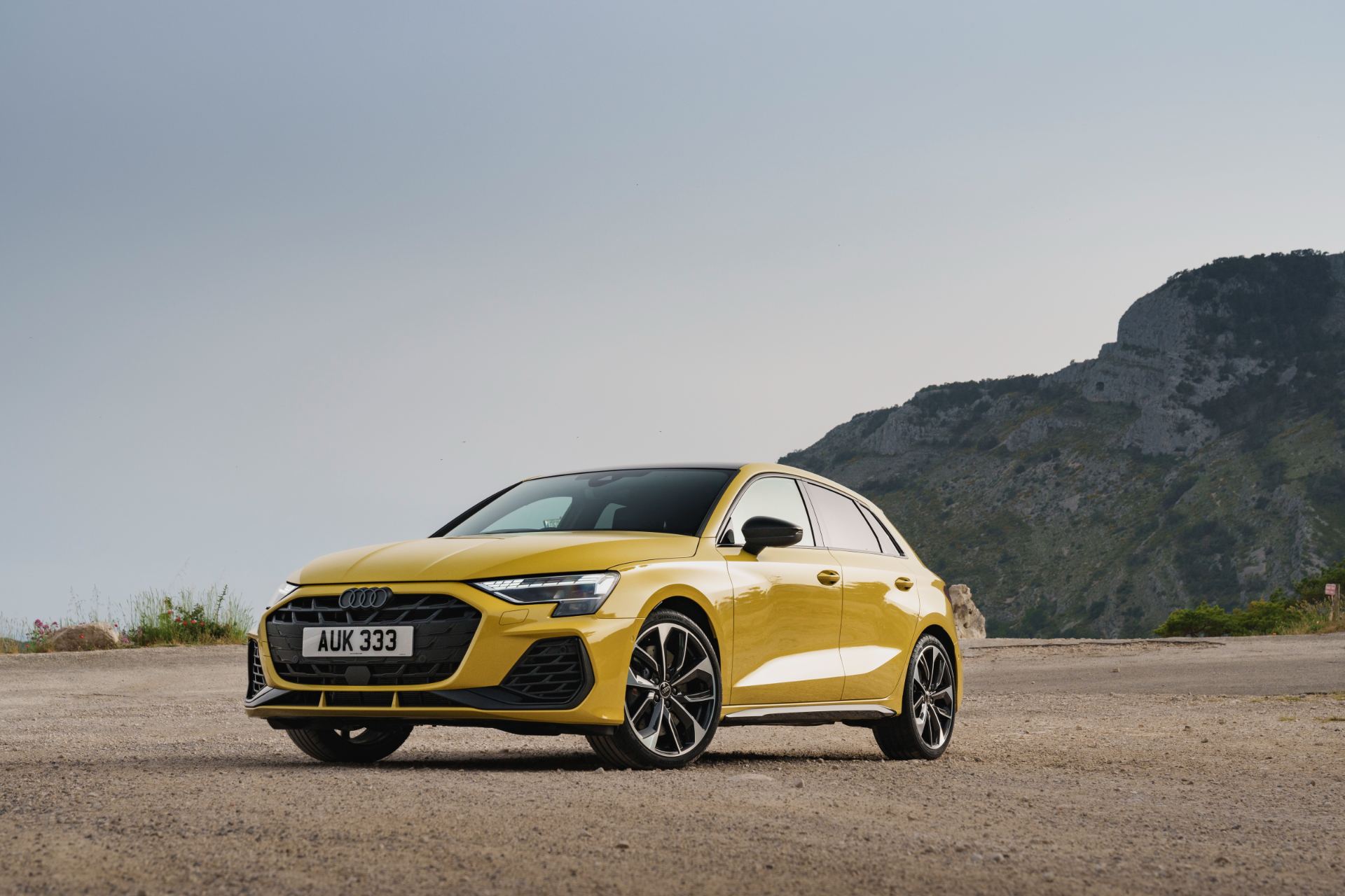 2025 audi s3 sportback front three quarter cliffs yellow