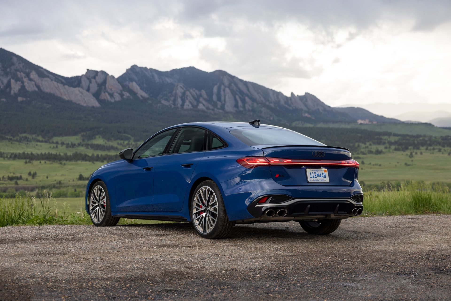 2026 audi s5 rear three quarter mountains blue