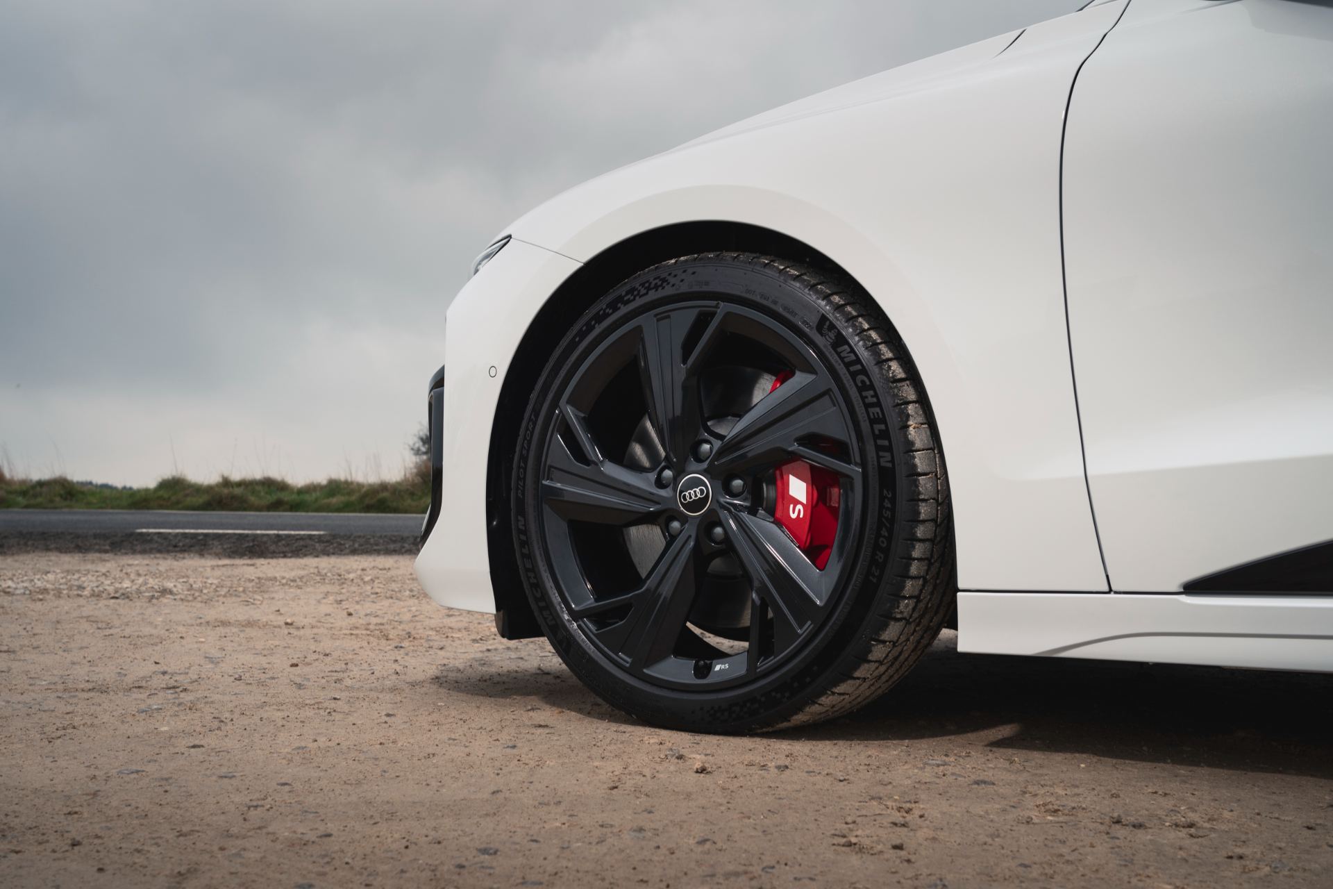 2026 audi s6 avant e tron front wheel red brake caliper