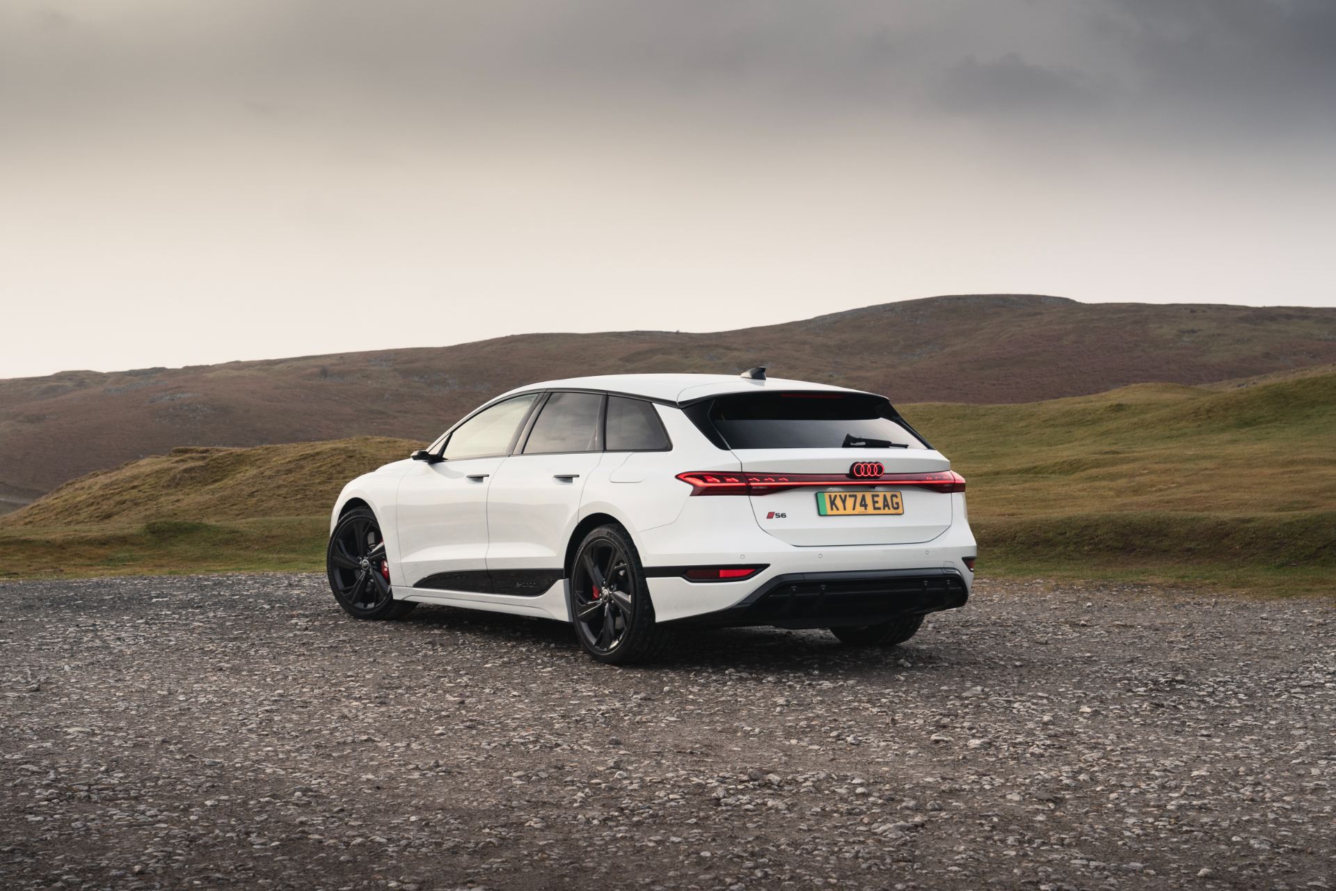 2026 audi s6 avant e tron rear three quarter moorland white
