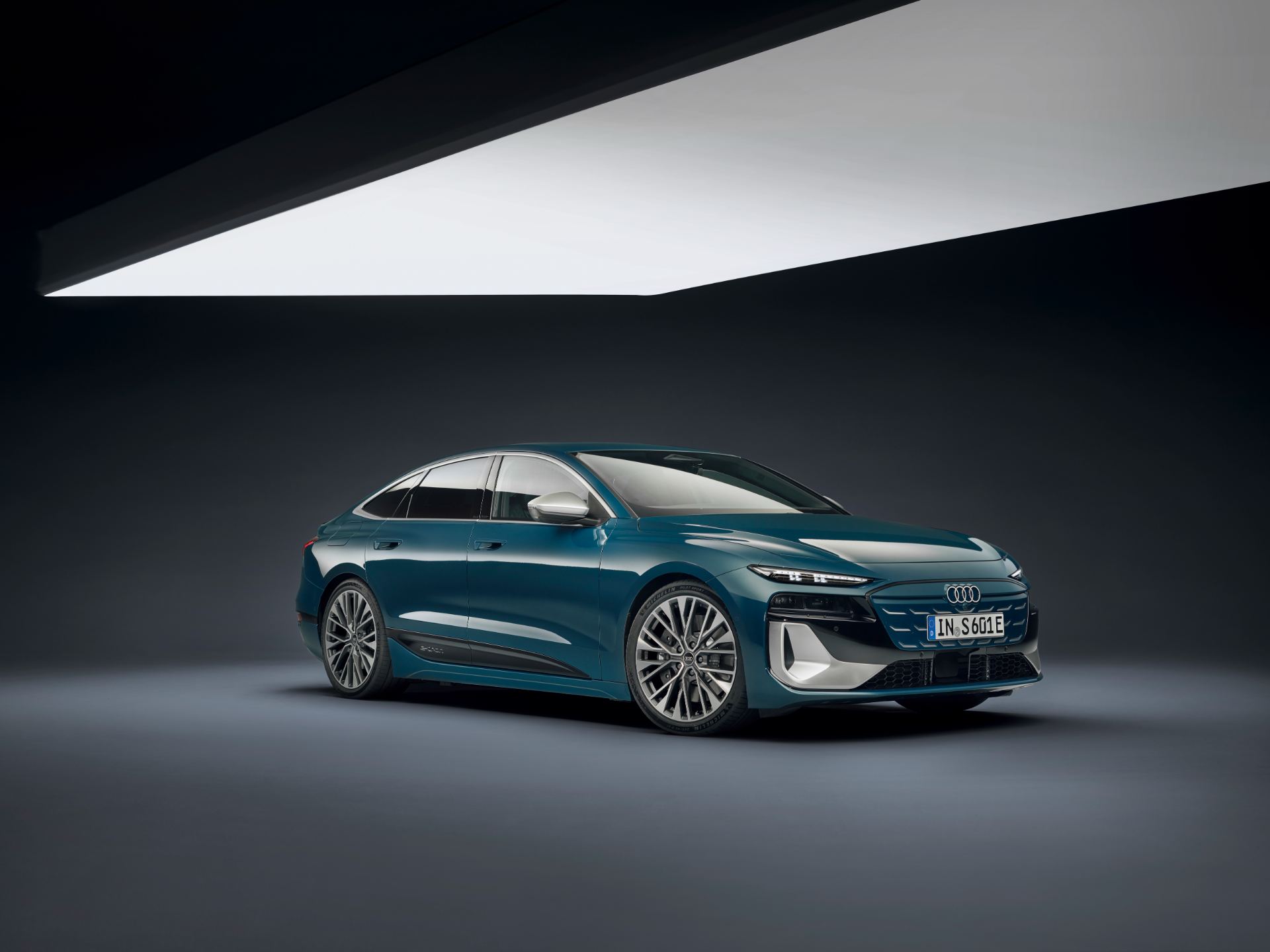 2026 audi s6 sportback e tron front three quarter studio right teal