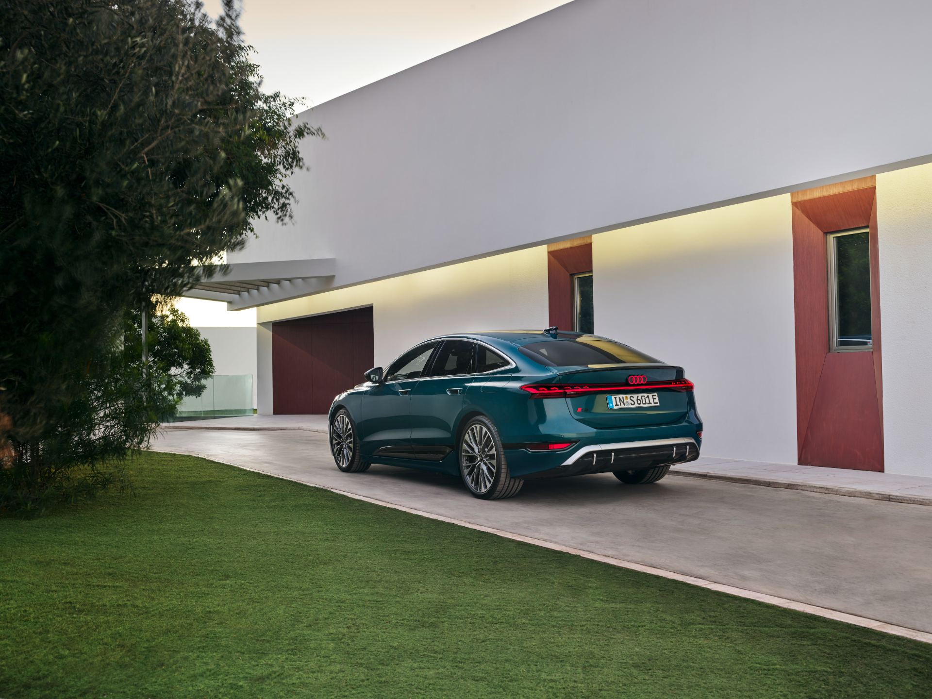 2026 audi s6 sportback e tron rear three quarter villa teal